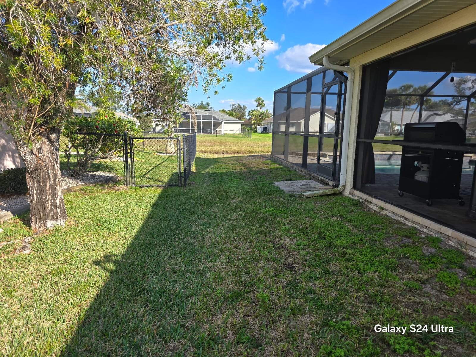 Waterfront Black Chain Link Fence Installation in Rotonda West by True Fence LLC