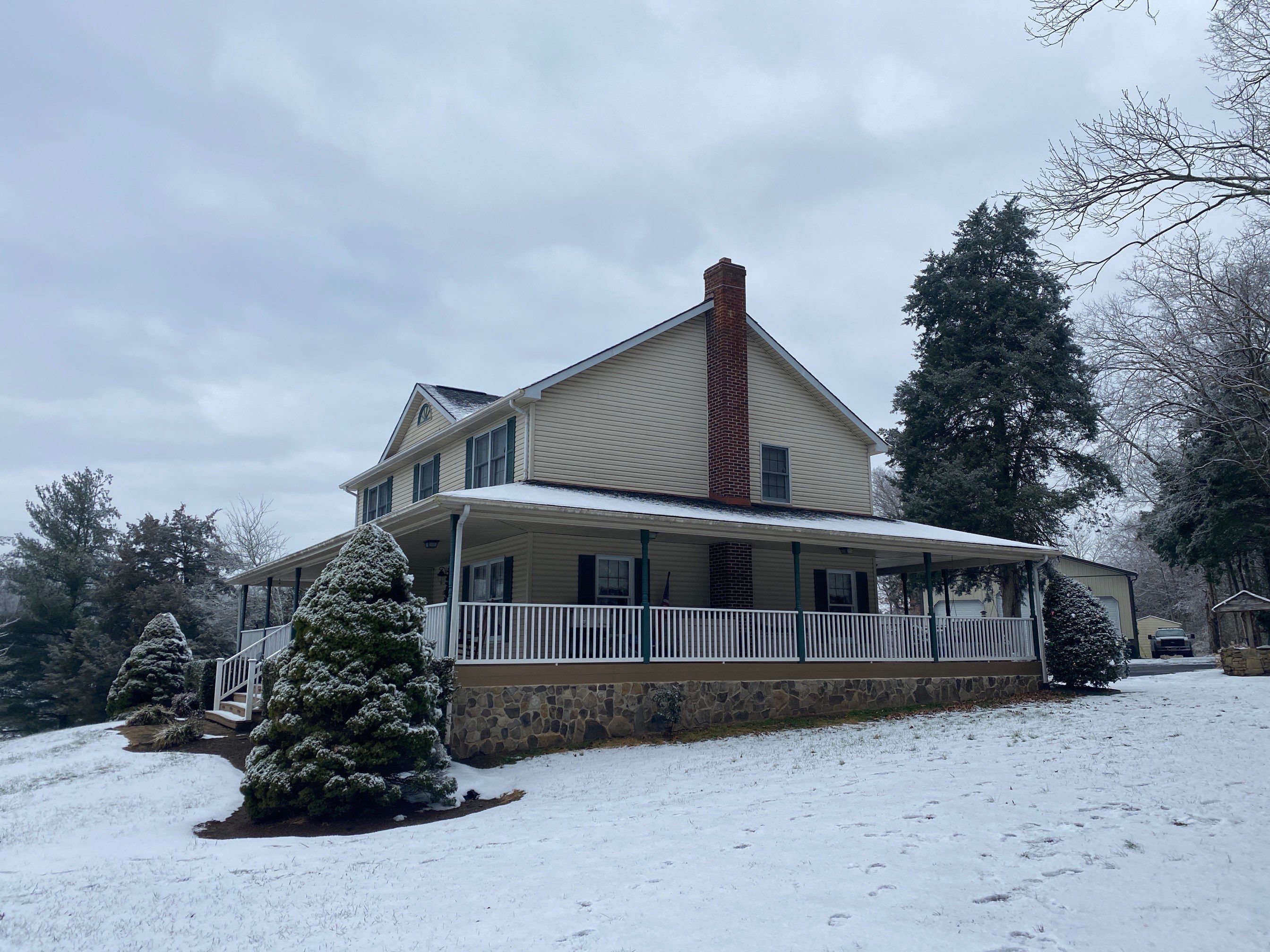 Exterior remodel including window replacement by American Home Contractors