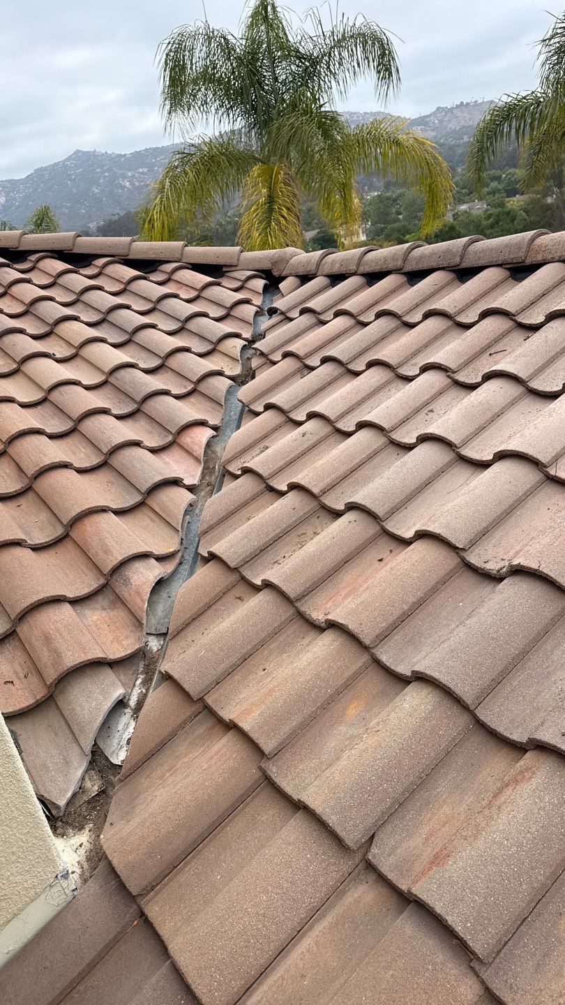 Terracotta Tile Roof Repair and Ridge Cap Sealing in Escondido by Reliable Roofing San Diego Inc.