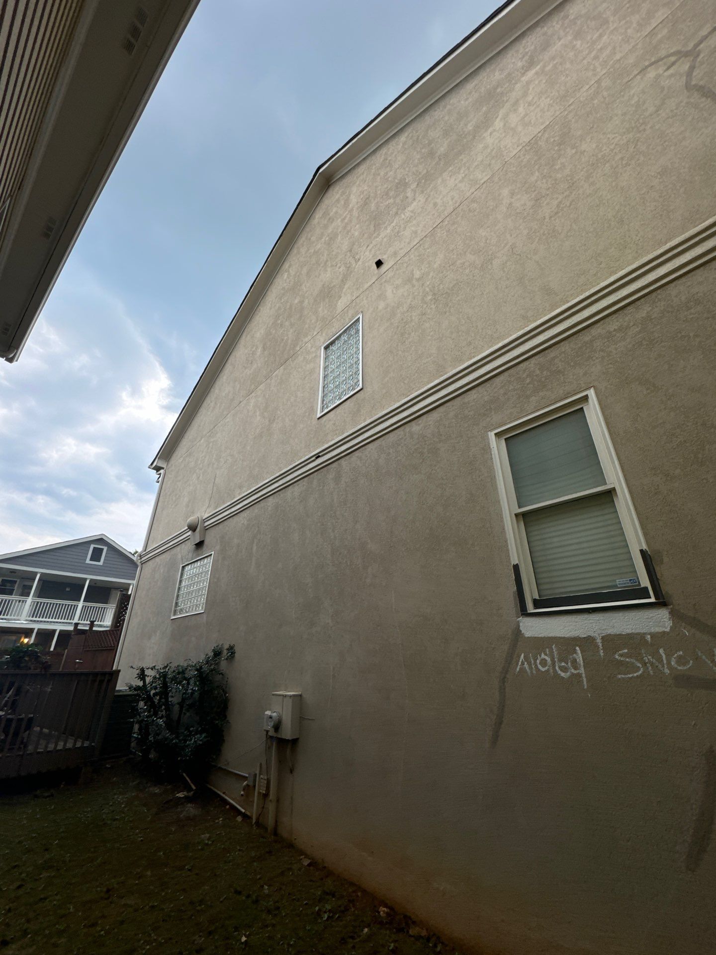 Full Exterior Stucco Painting and Wood Deck Staining in Atlanta by Swift Home Renovations
