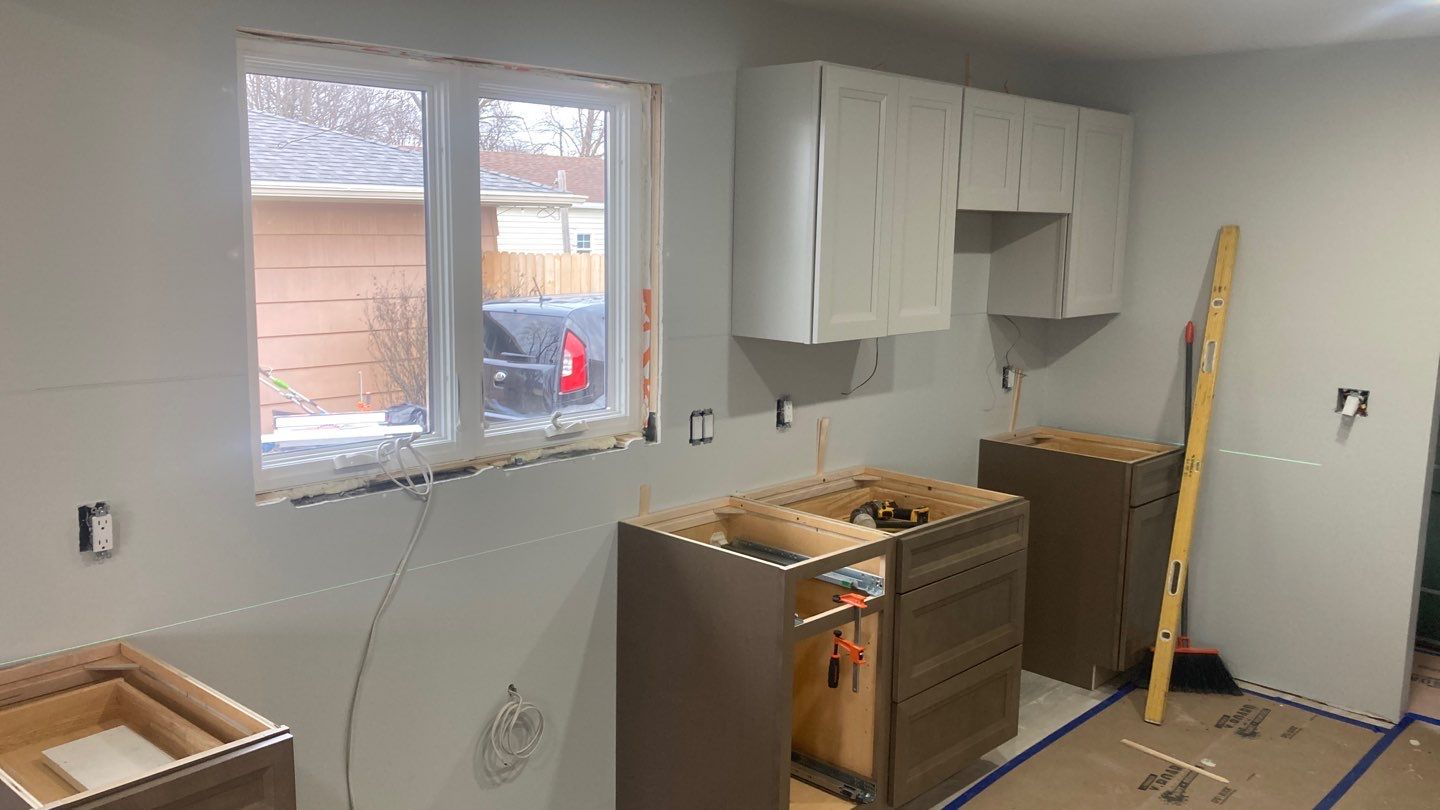 Interior Renovations, Kitchen Remodel, and Window Replacement by Ivy Lea Construction
