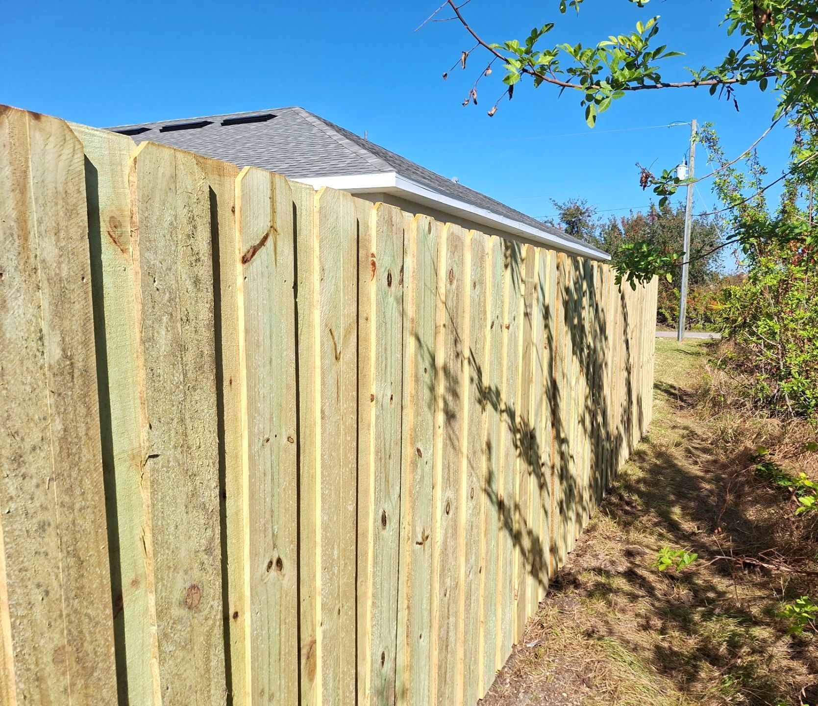 Wood Fence Installation using 6Ft Pressure Treated Wood Board On Board Privacy Fence by Asap fence and gates, LLC
