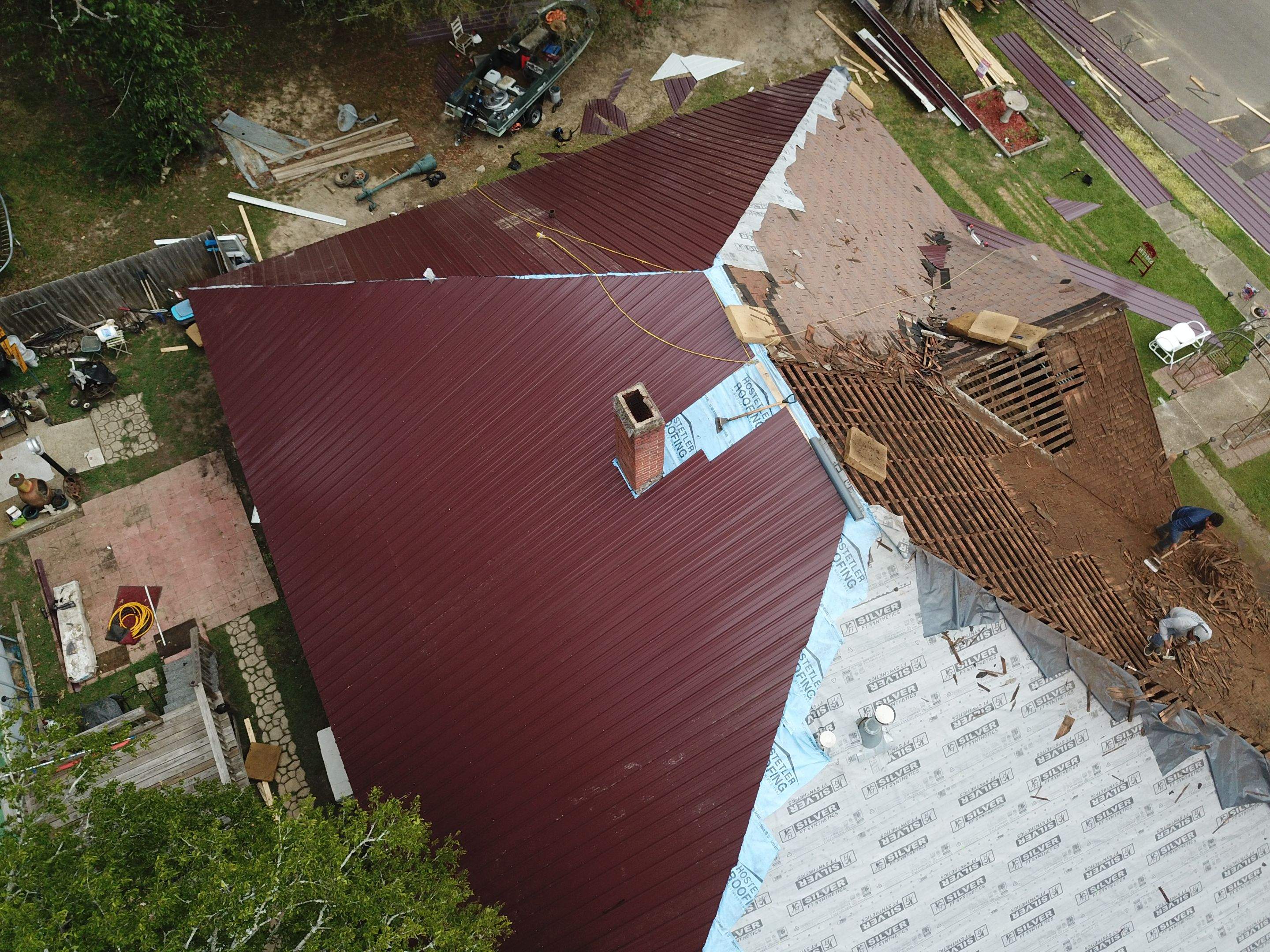Residential Metal Roof Replacement using Reed's Metals: Colored Residental Panel (Burgundy) by Hostetler Roofing