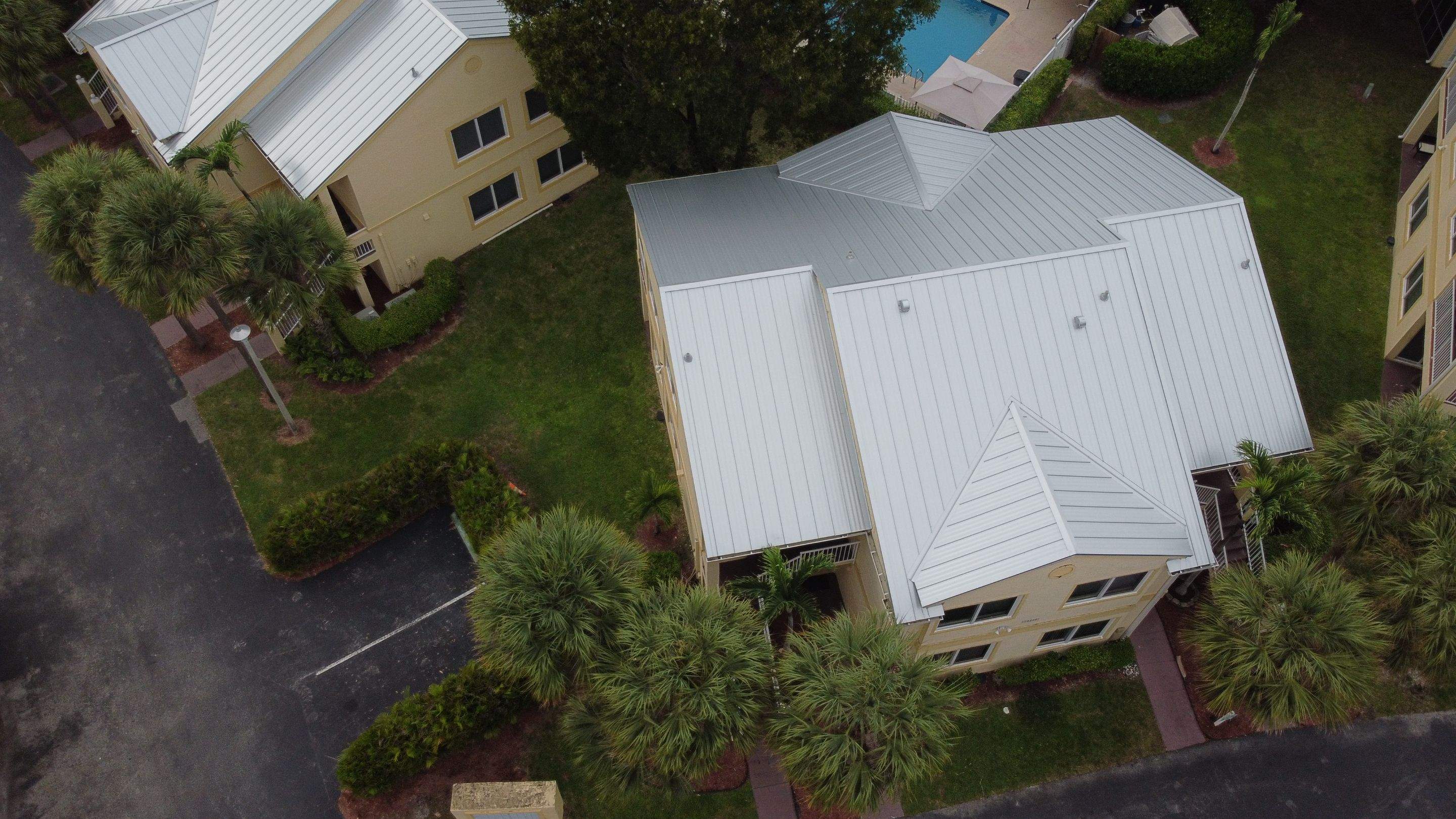 Commercial Roofing Installation using 1" Nail strip metal roof by BLUES BROTHERS ROOFING
