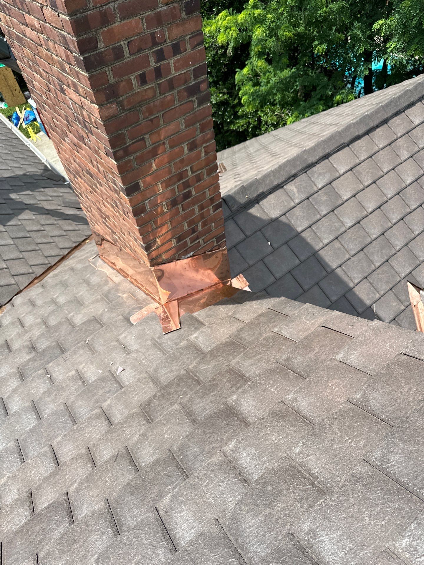 Residential Roofing Installation Using Enviroshake Synthetic Slate by Undersun Roofing 