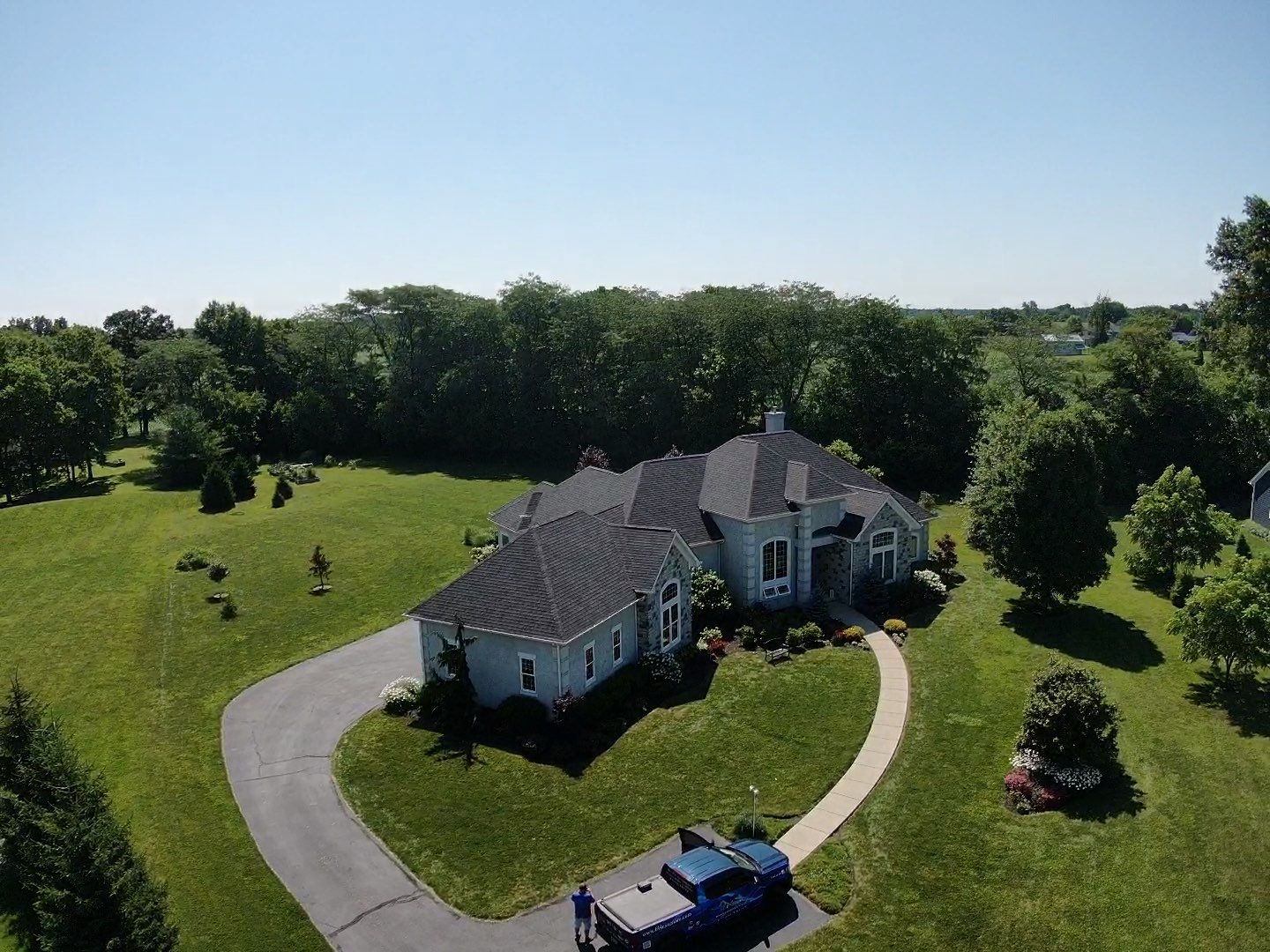 Residential Roofing Installation using Atlas Pinnacle Black Shingles by 614 Exteriors