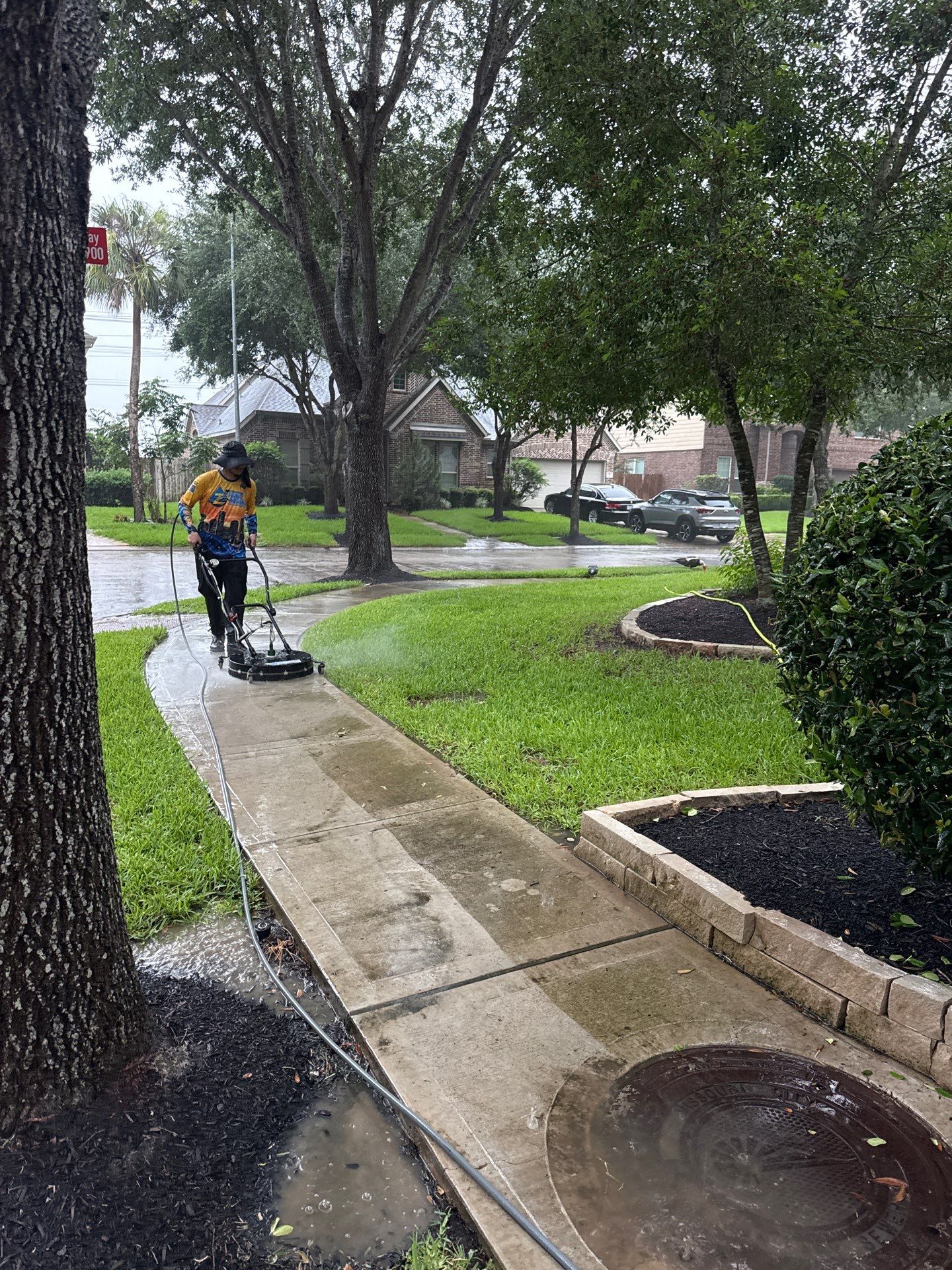 Residential Concrete Surface Cleaning and Fence Restoration in Missouri City by Zeal Power Washing