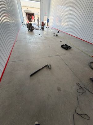 Commercial Storage Bay Epoxy Flake Floor Installation in North Muskegon