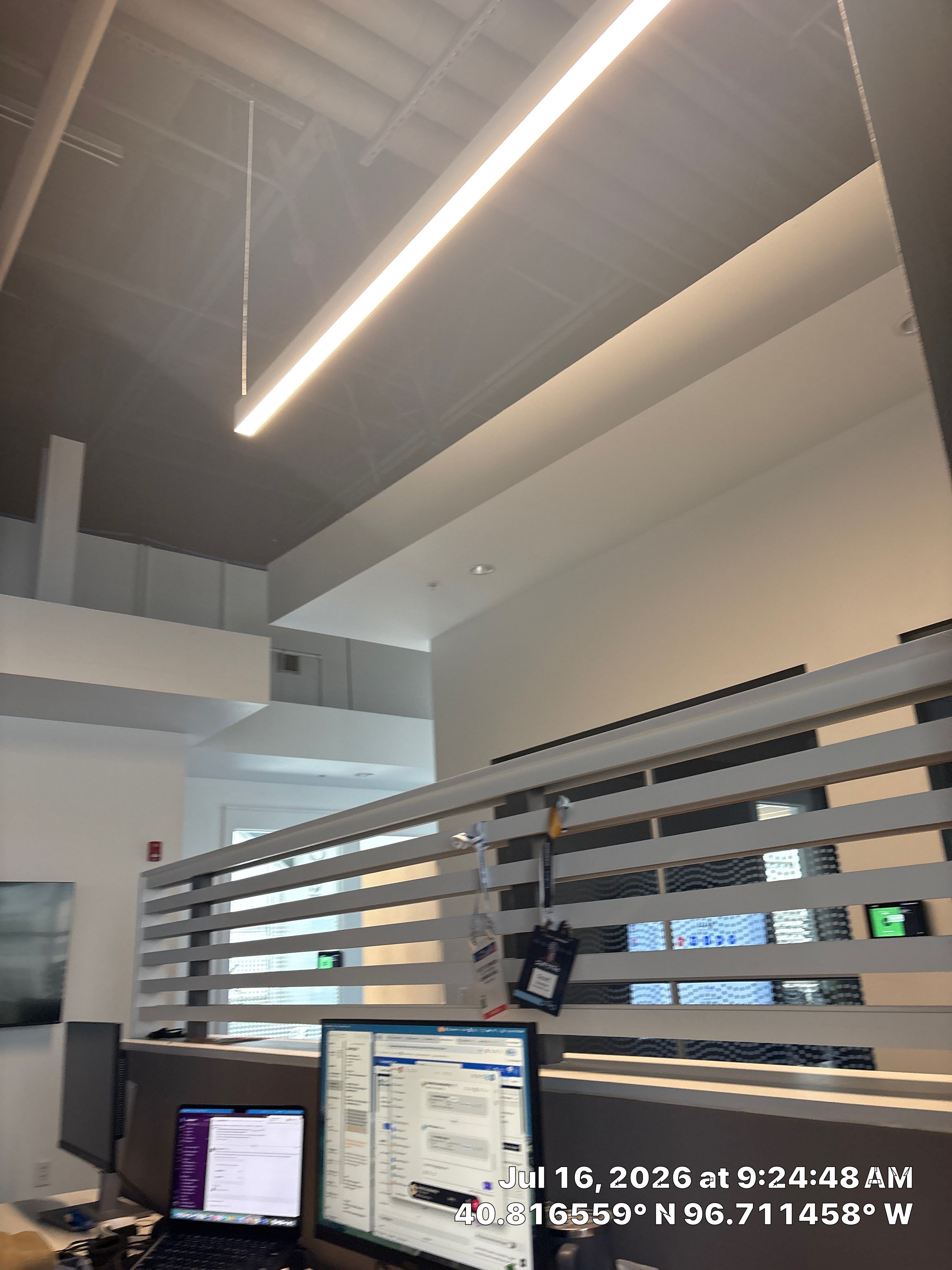Modern Office Interior Renovation and Acoustic Baffles in Lincoln by CompanyCam Sales Demo