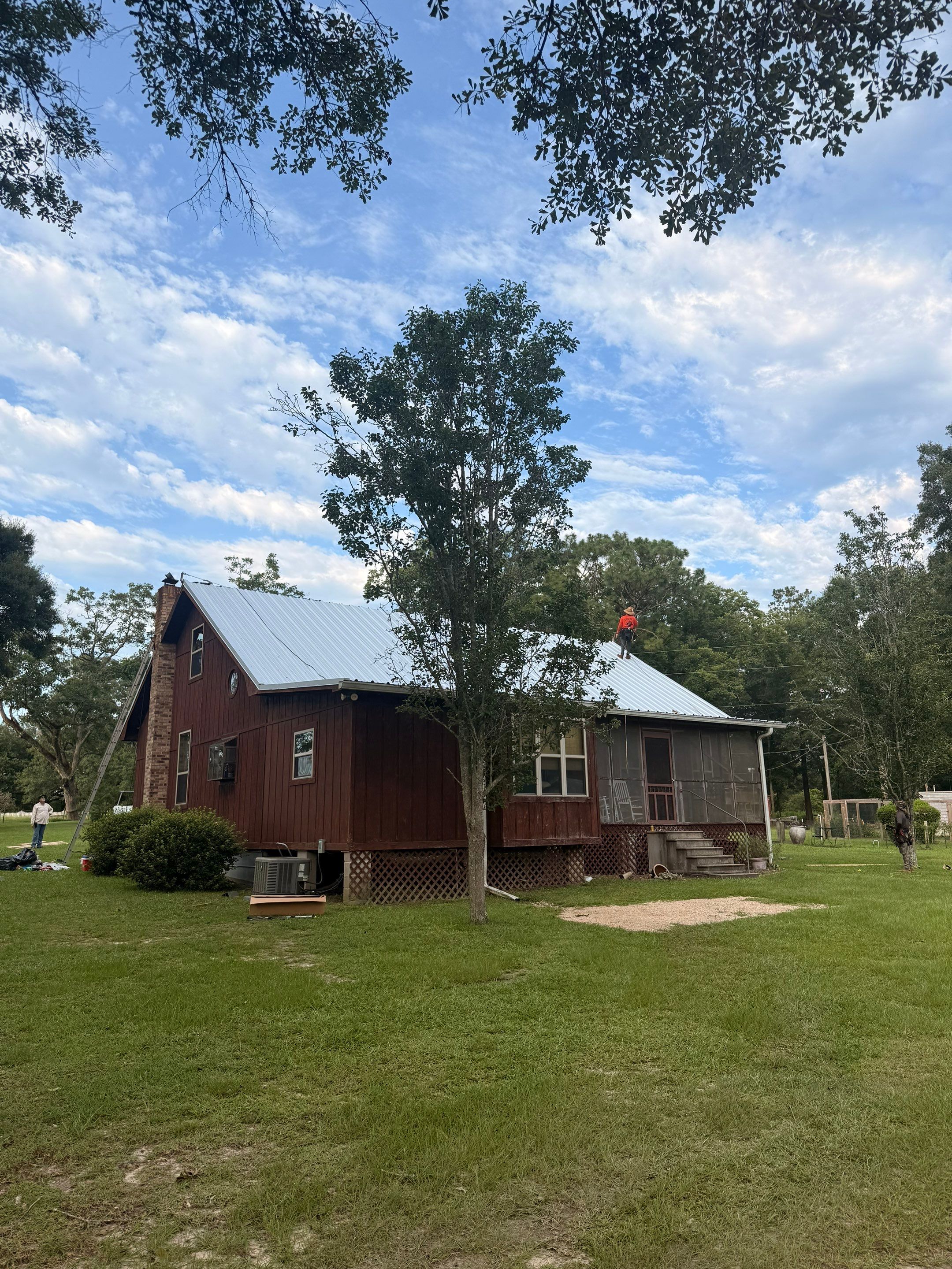 Residential Metal Roof Replacement With Corrugated Panels in Poplarville by Frontline Roofing