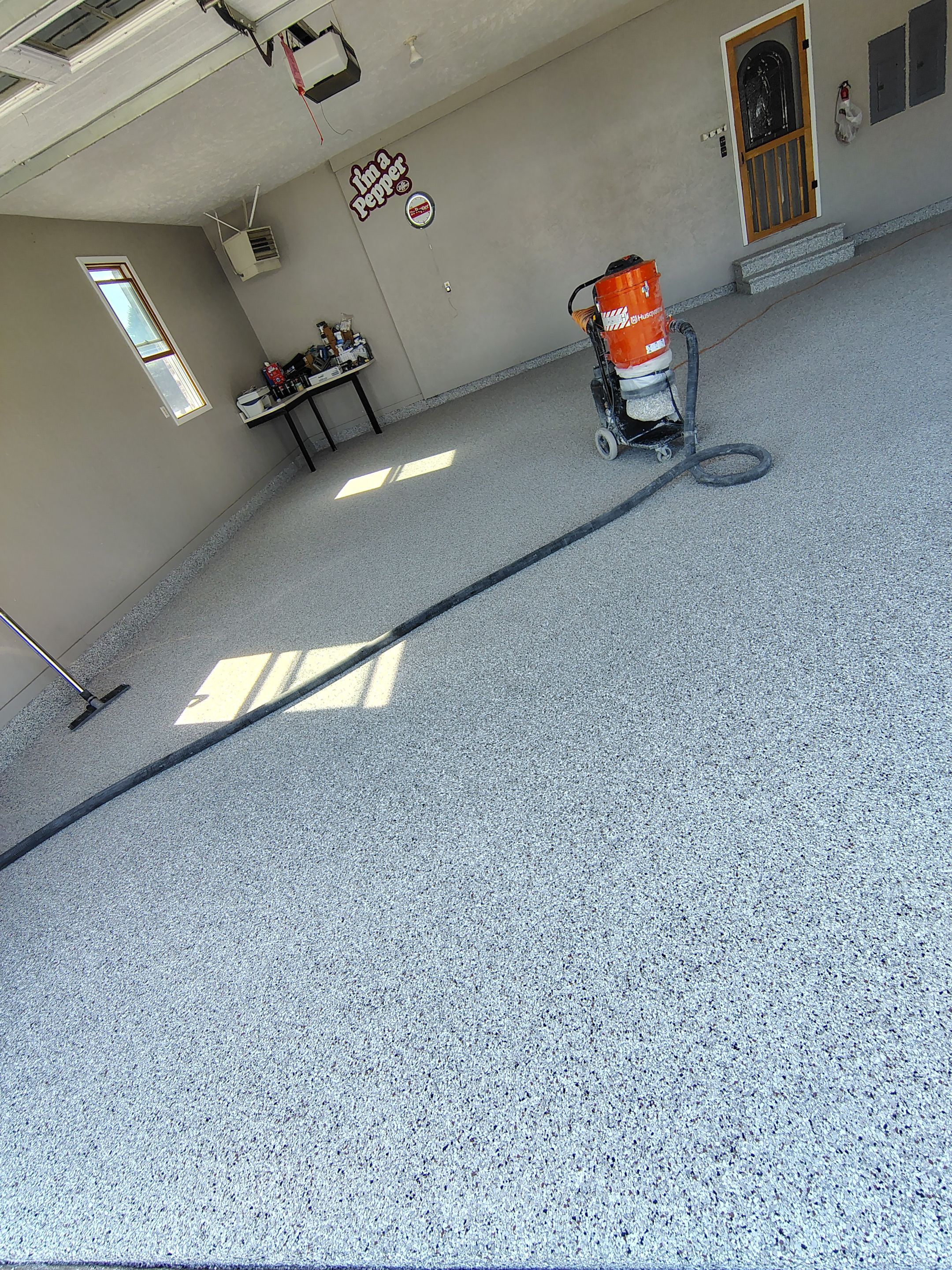 Garage Concrete Floor Coating and Crack Repair in Onawa by Select Painting, Coatings & Garage Cabinets