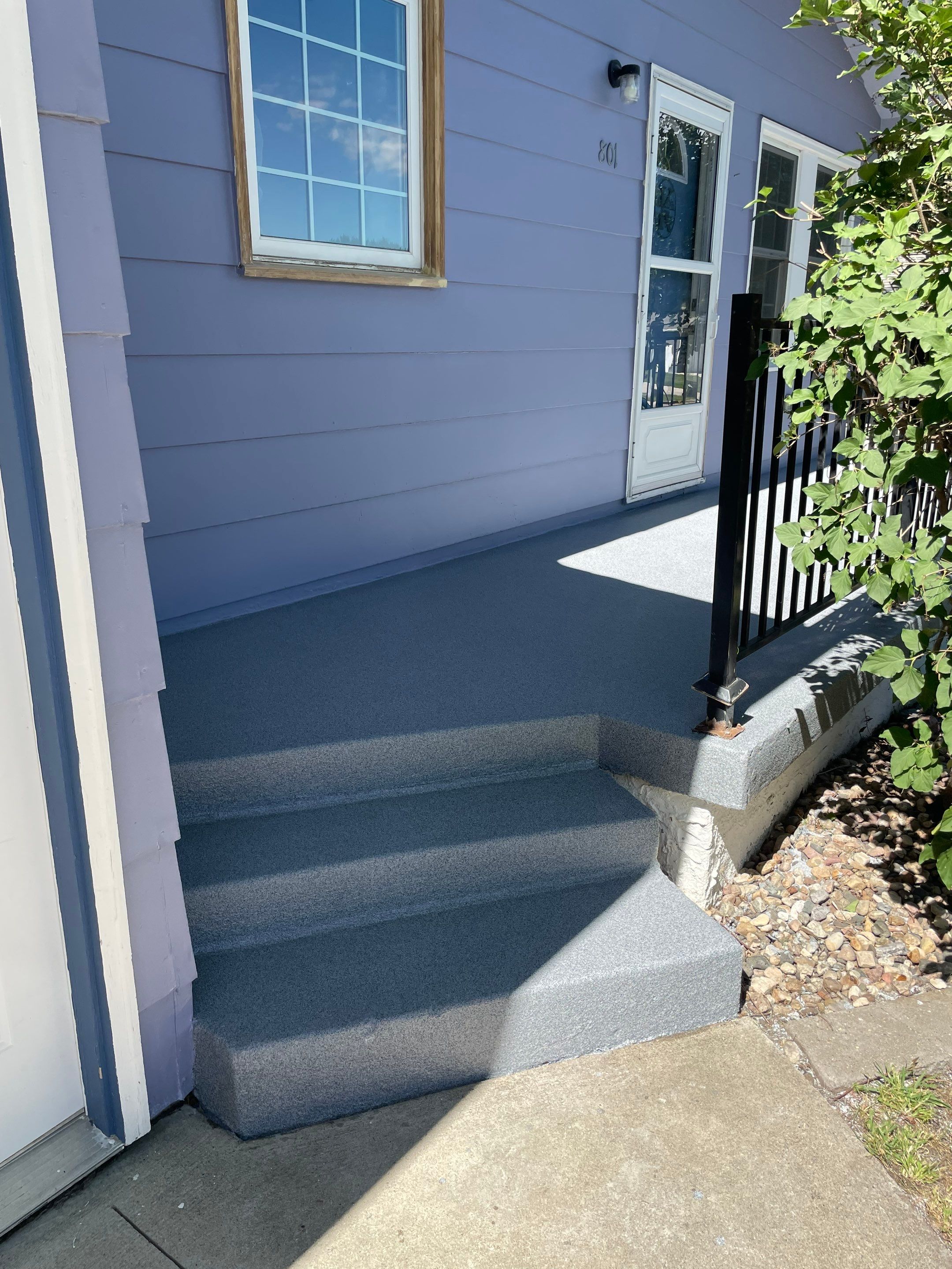 Sioux Falls Concrete Porch Coating with Starry Evening Finish by Select Painting, Coatings & Garage Cabinets
