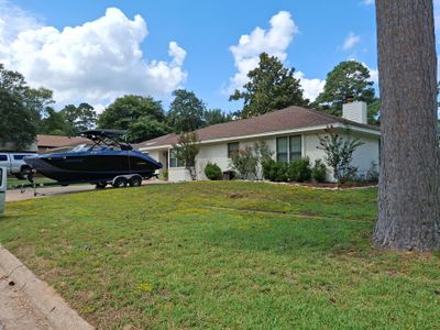 Exterior Painting in Flint, TX | White Brick Home & Metal Building with Sherwin-Williams Duration