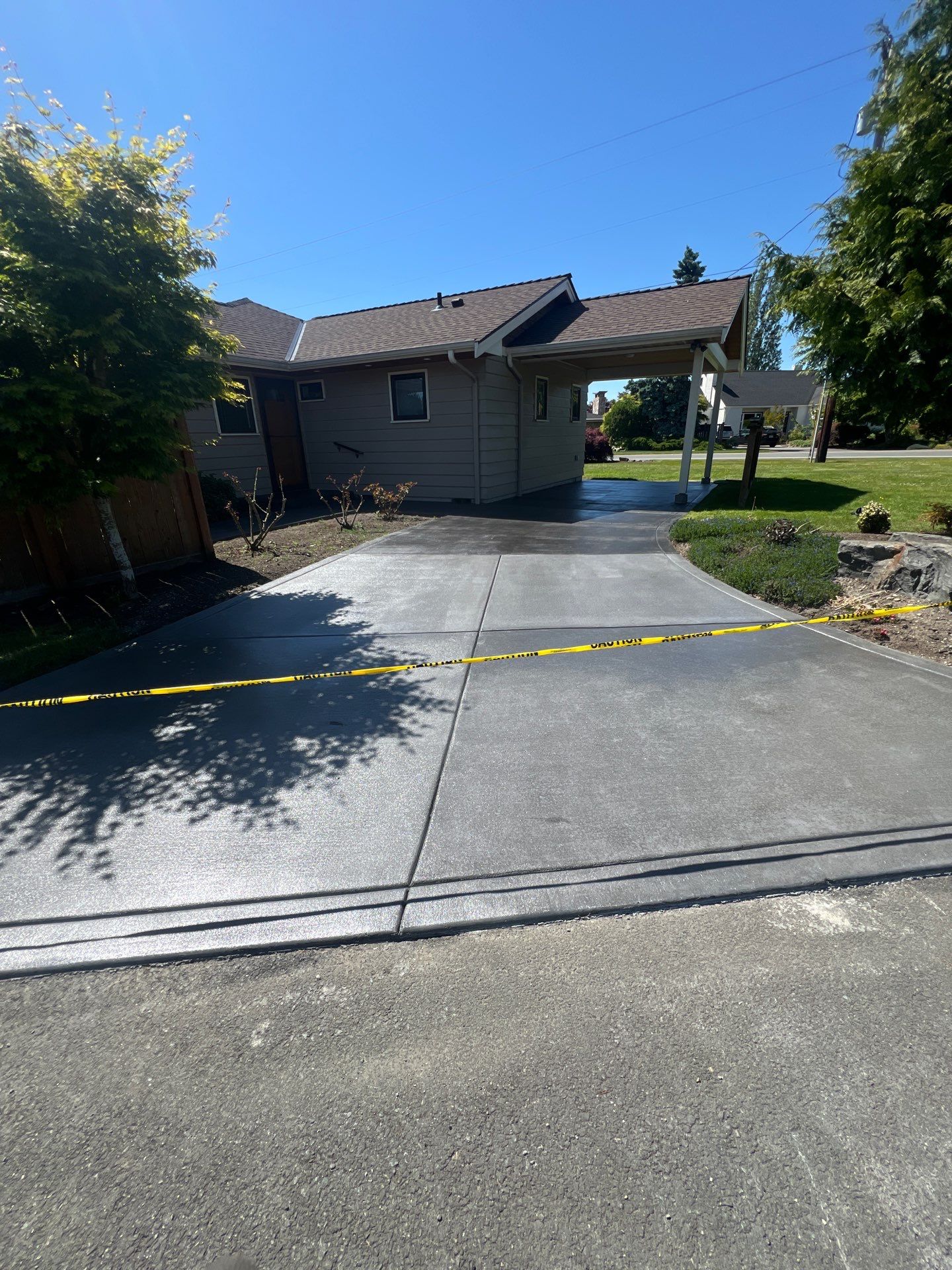 Colored Concrete Driveway Repair with Sealer| Everett    by Jireh Asphalt & Concrete Inc 
