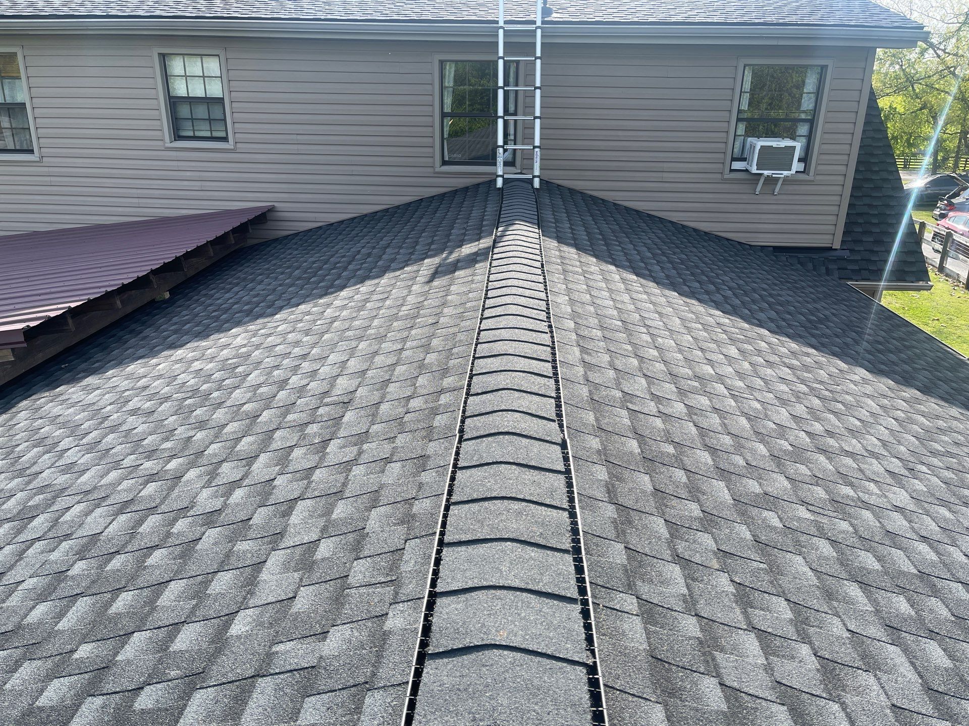 Residential Roofing Installation using GAF Timberline HDZ Charcoal by Undersun Roofing 