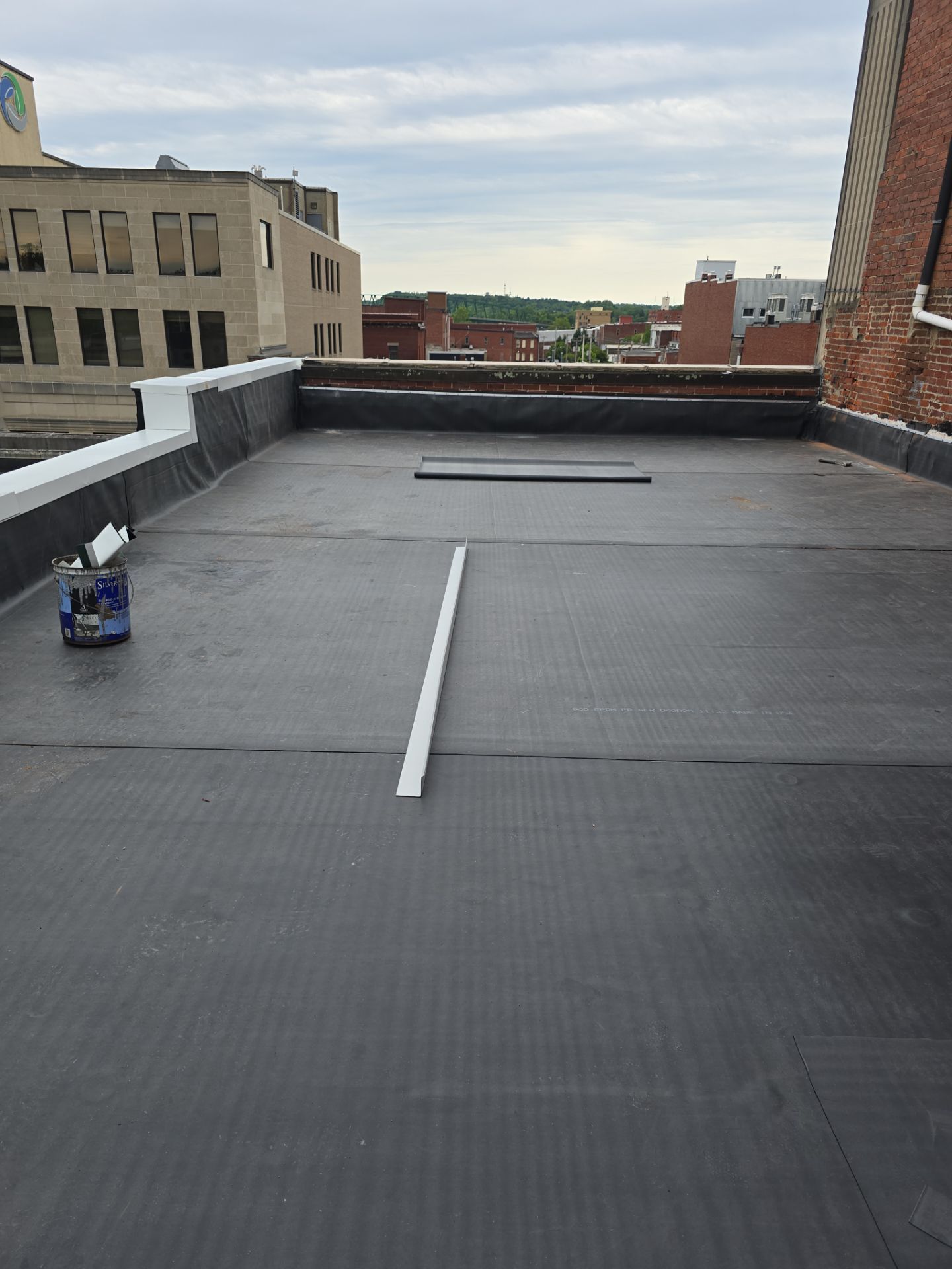 Commercial Roofing Installation using EPDM  by Rainstoppers Roofing