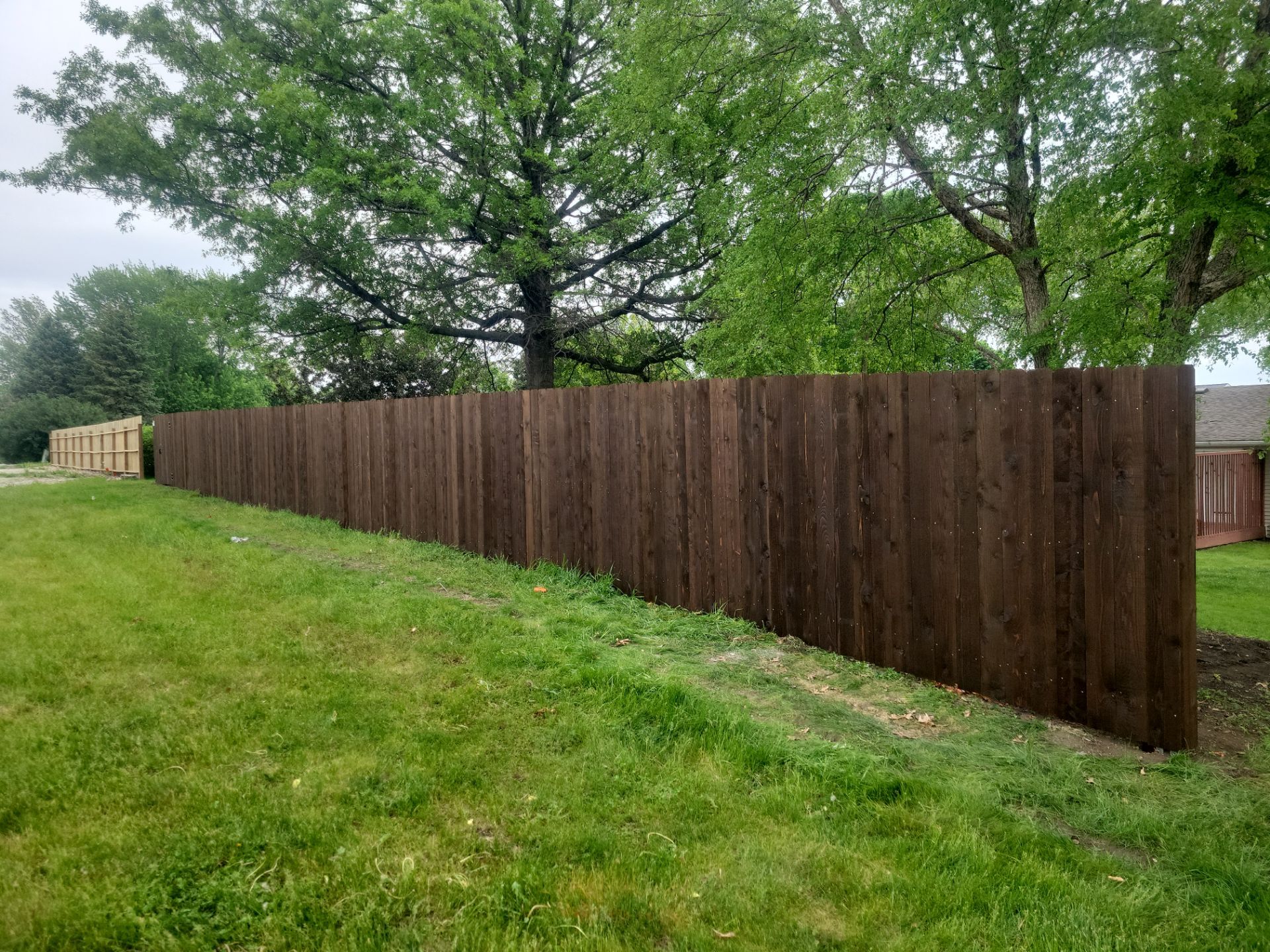 Chain Link and Cedar Privacy in Grundy Center by Perfect Picket Fence and Stain