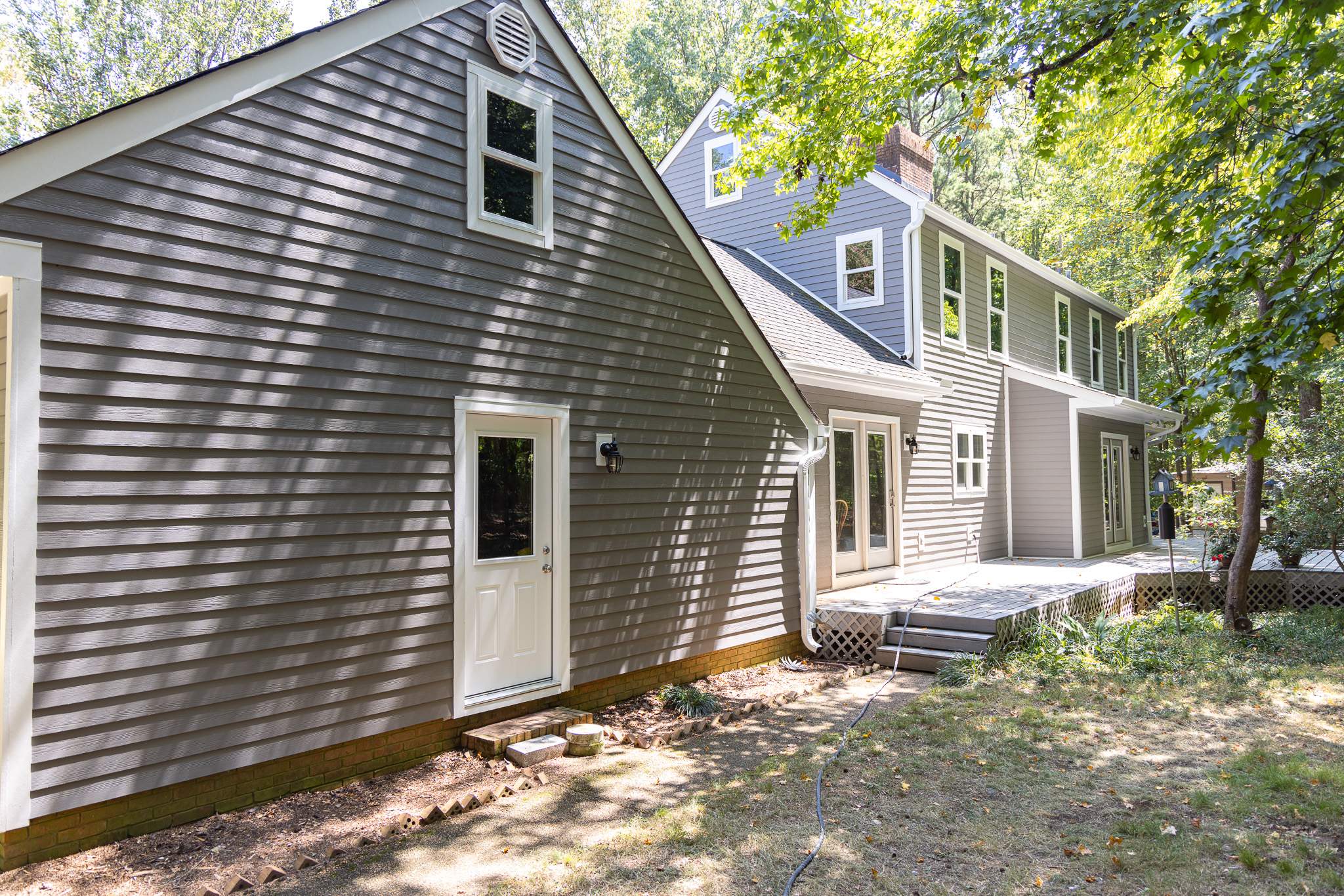 Aged Pewter Hardie + Windows by Freedom Exteriors