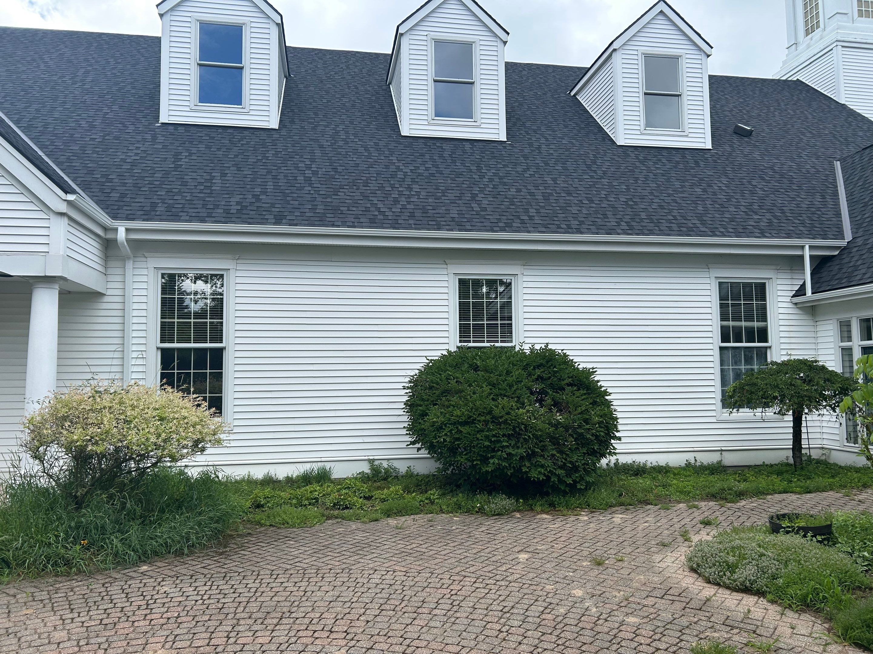 Gutter and Gutter Screen Installation for Harbor Springs Church by Rainbow Seamless Systems