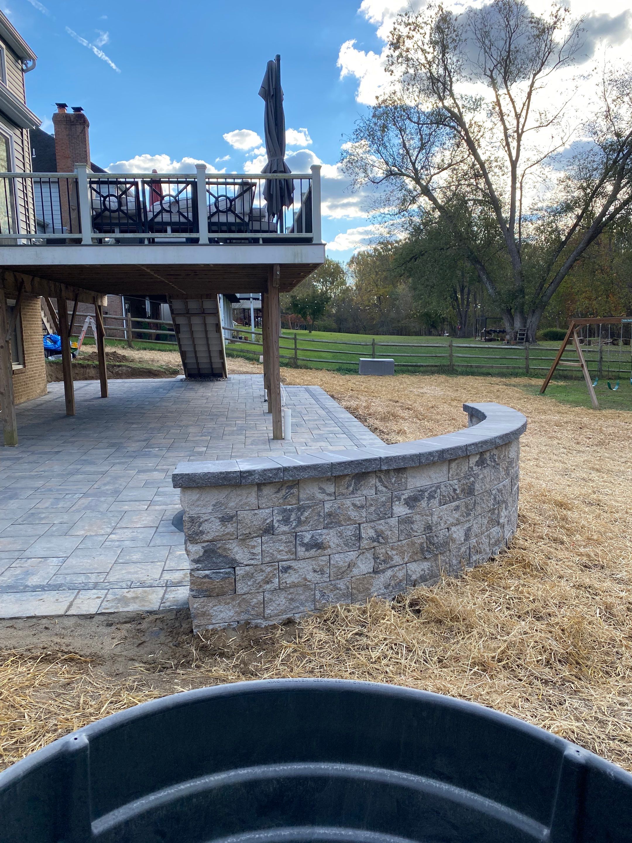 Backyard Transformation using Techo-Bloc Pavers by The Smet Companies, LLC