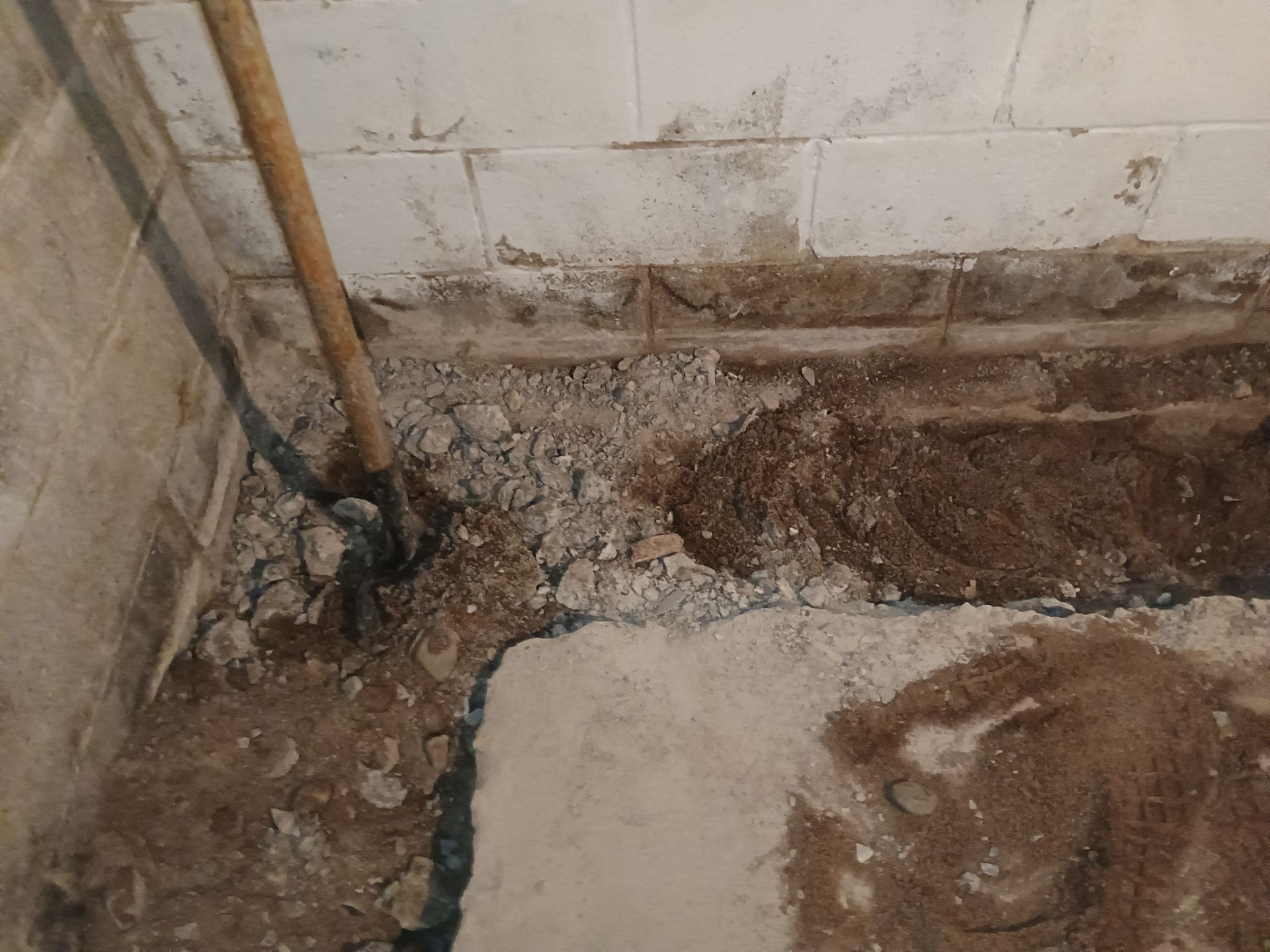 Interior Drain Tile Installation near Columbia Heights, MN by Waterproofing Northeast