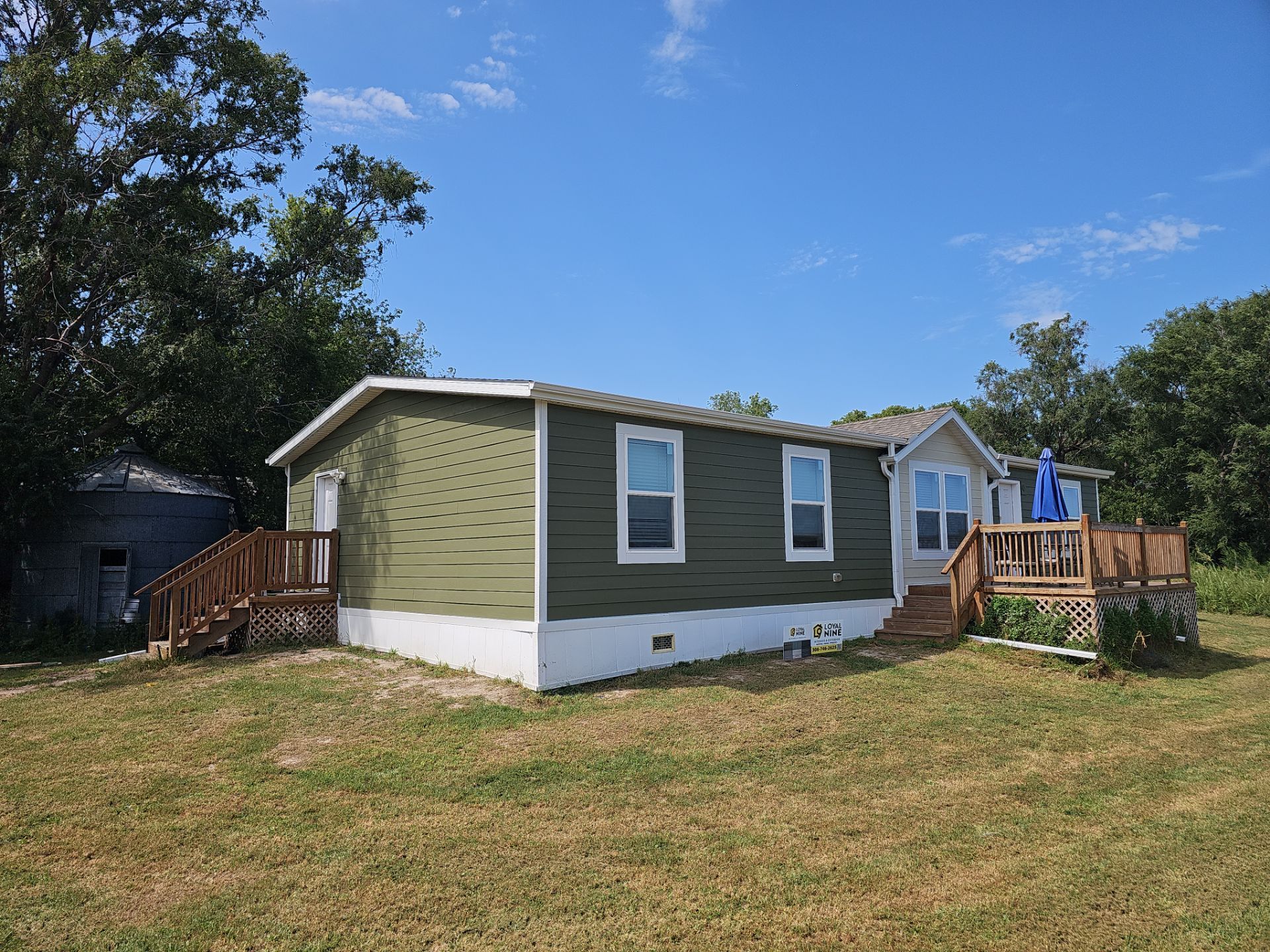 Riverdale Exterior Transformation | TAMKO Roofing & James Hardie Siding by Loyal Nine