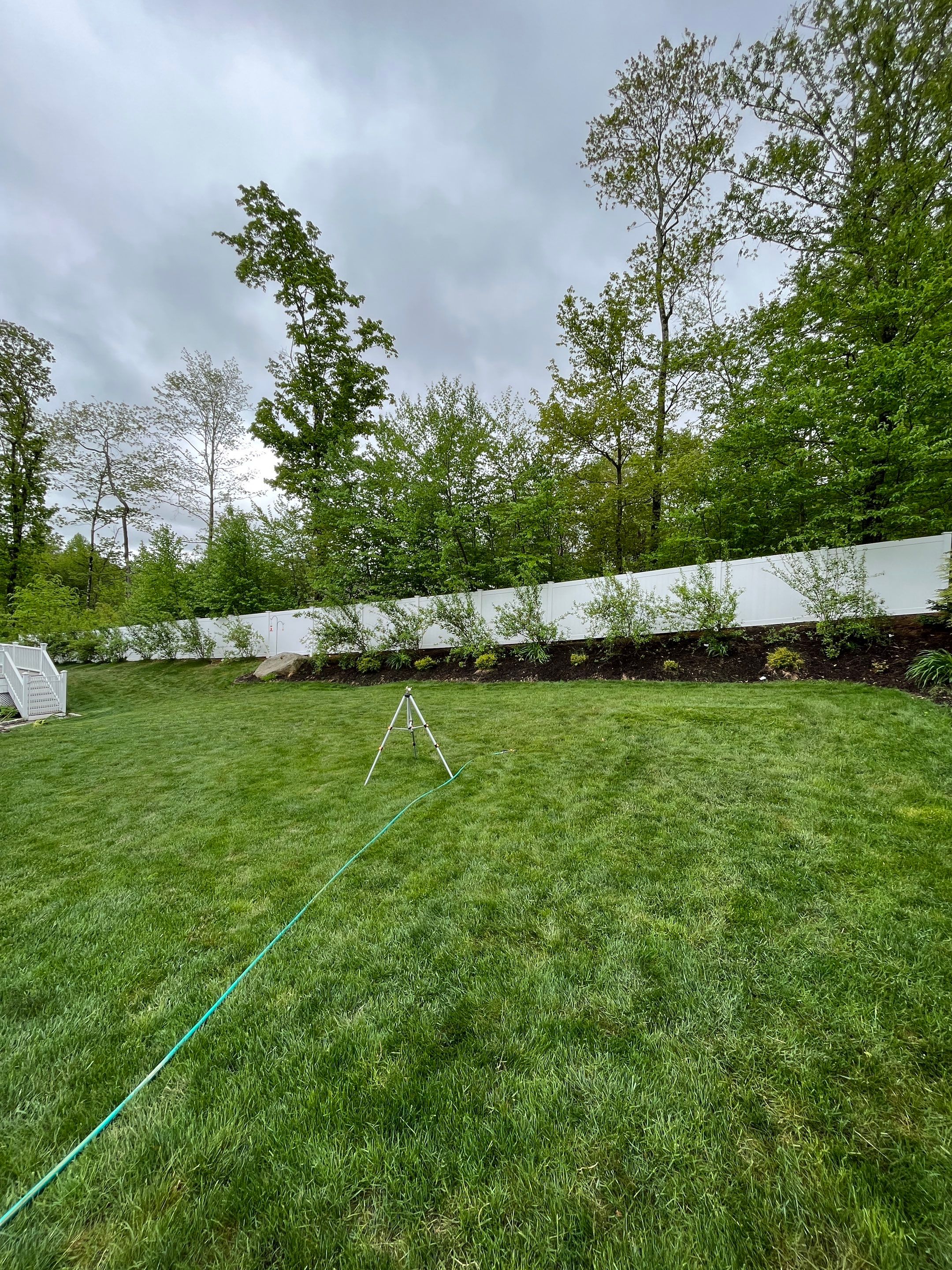 New Vinyl Privacy Fence in White by DiGiorgi Roofing and Siding Inc