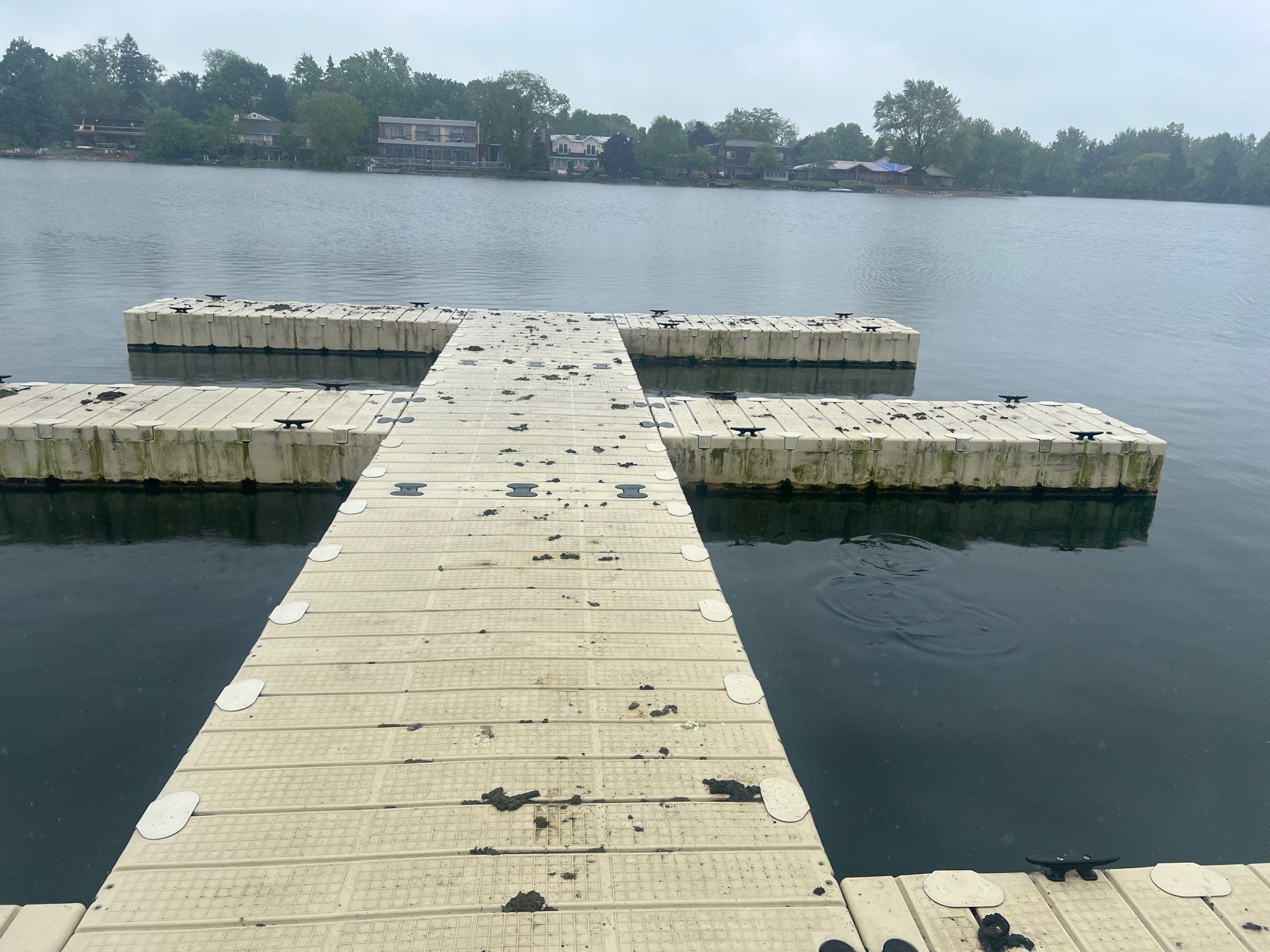 Power washing of floating dock by Northern Power Washing LLC.