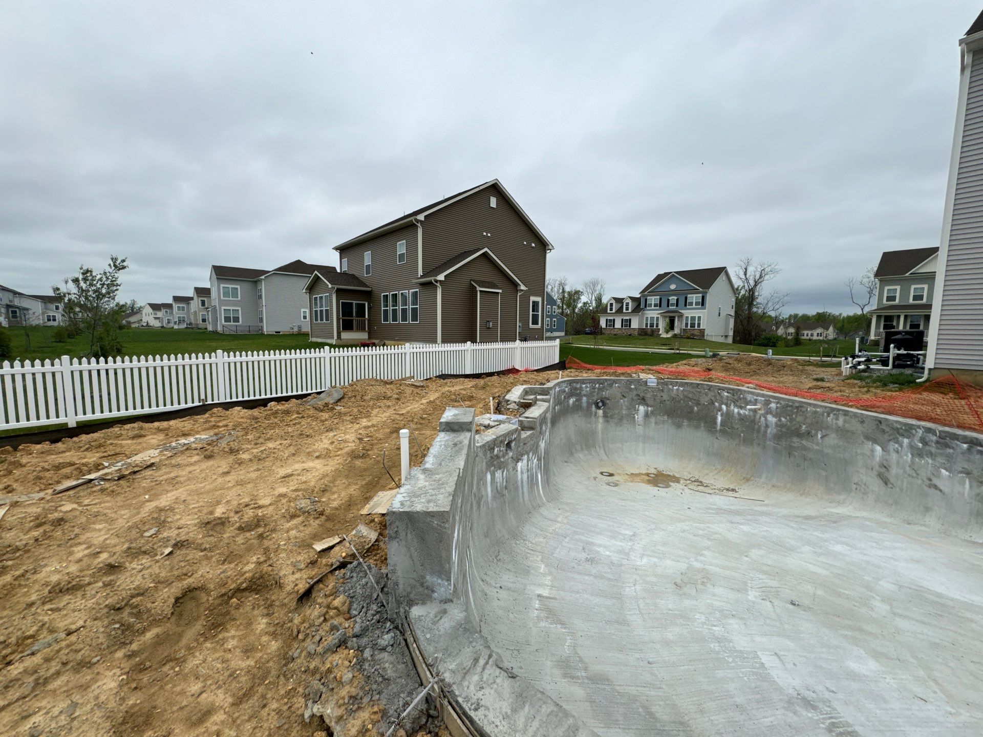 Pool and Hardscape Design in Delaware | Belgard Paver Patio & Outdoor Living Space by Studio G Indoor Spaces & Outdoor Living