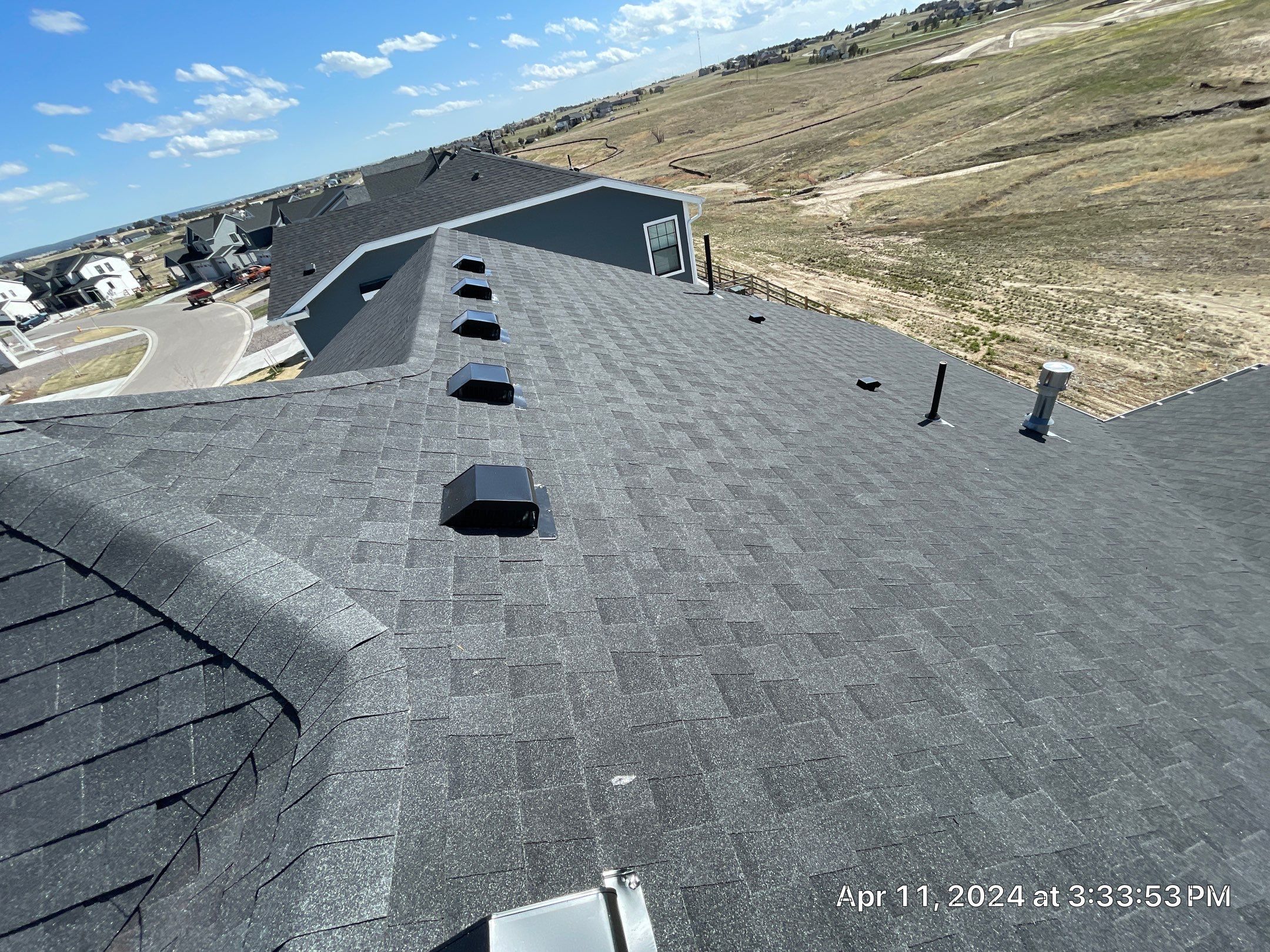 Residential Roofing Installation using Atlas Pinnacle Impact Black Shadow by Blue Peaks Roofing LLC 
