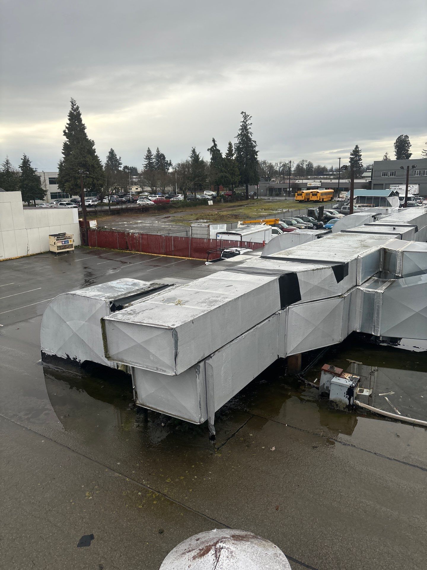 Summit Grey Lum Yun Salem Oregon Commercial Roof by Orezona Building & Roofing Company, Inc.