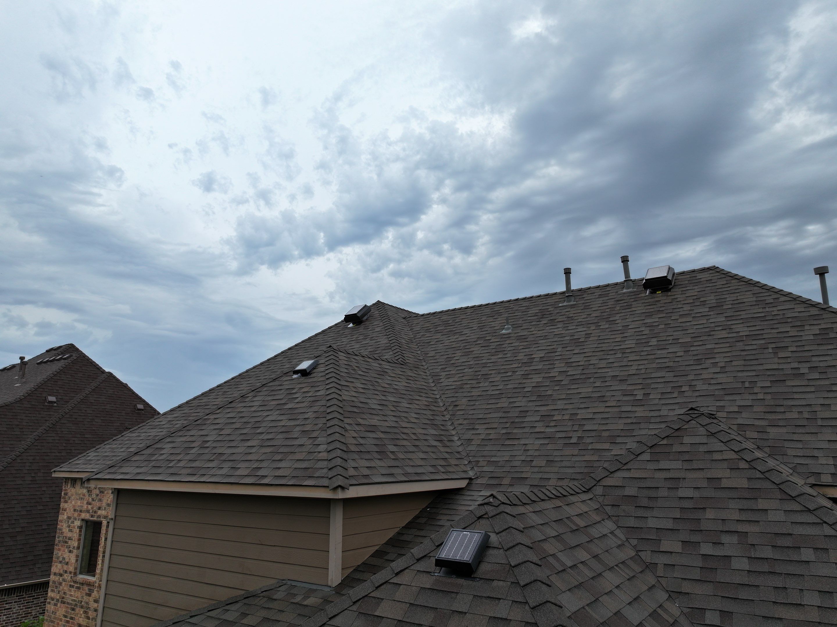 Installing Custom copper turret and Malarkey Vista Class 4 shingles Hail Damage Upgrade by Becker Roofing and Exteriors