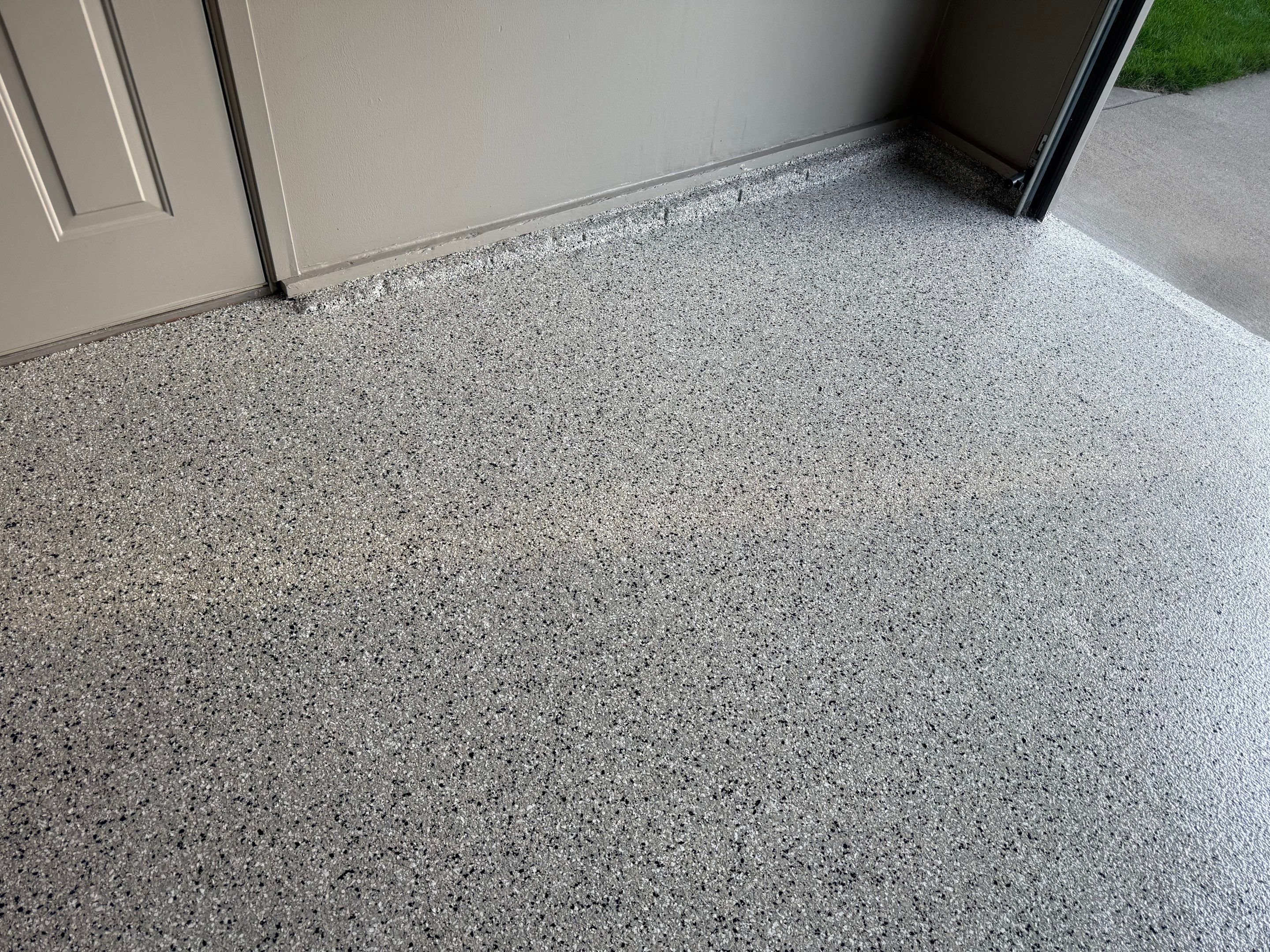 Cabin Fever Concrete Coating for Sioux Falls Garage by Select Painting, Coatings & Garage Cabinets