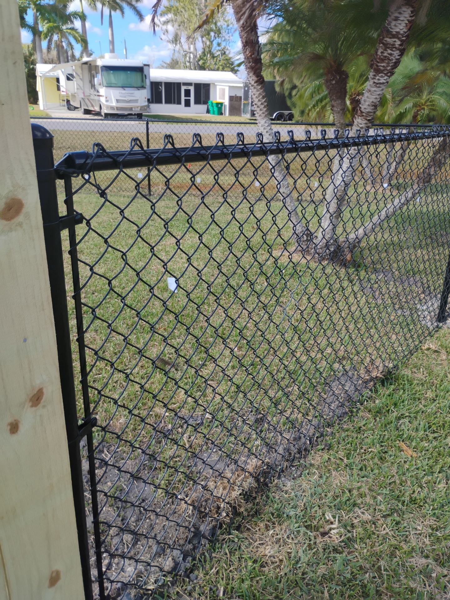 Wood and Chain Link Fence in Port Charlotte by True Fence LLC