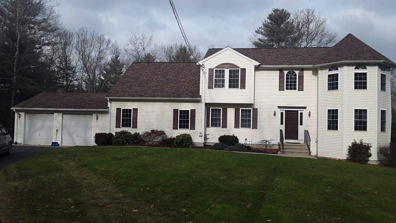 Burnt Sienna Roofs by Pinnacle Roofing & Skylights