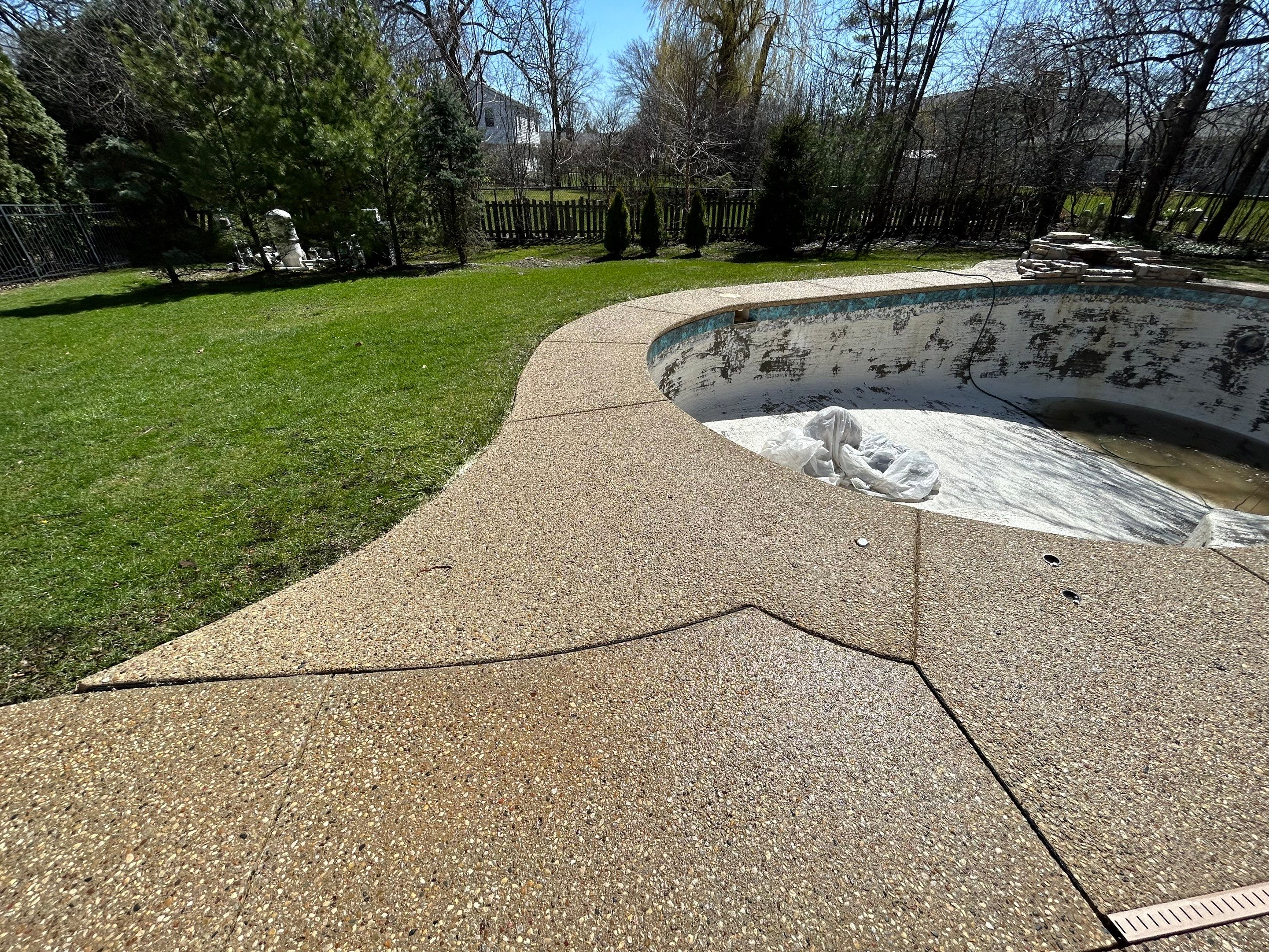 Aggregate Clean and seal using low gloss sealer by Northern Power Washing LLC.