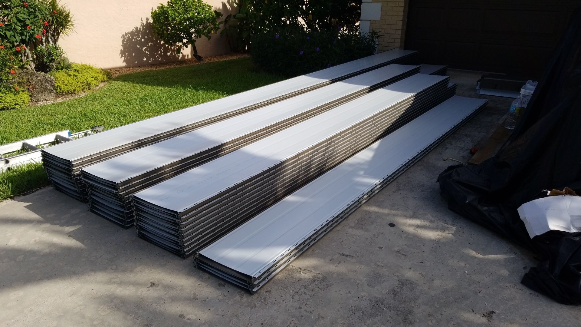 Residential Roofing Installation using 1" Nail strip metal roof by BLUES BROTHERS ROOFING