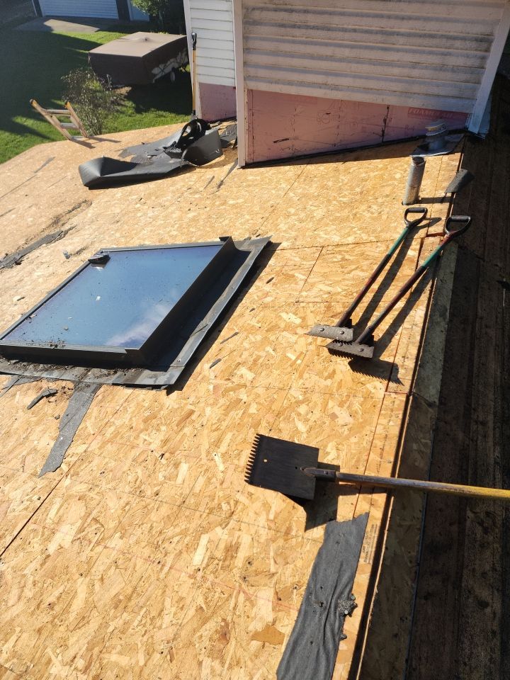 Residential Roof Installation and Skylight Replacement in Kiel, WI by Gellings Roofing & Siding