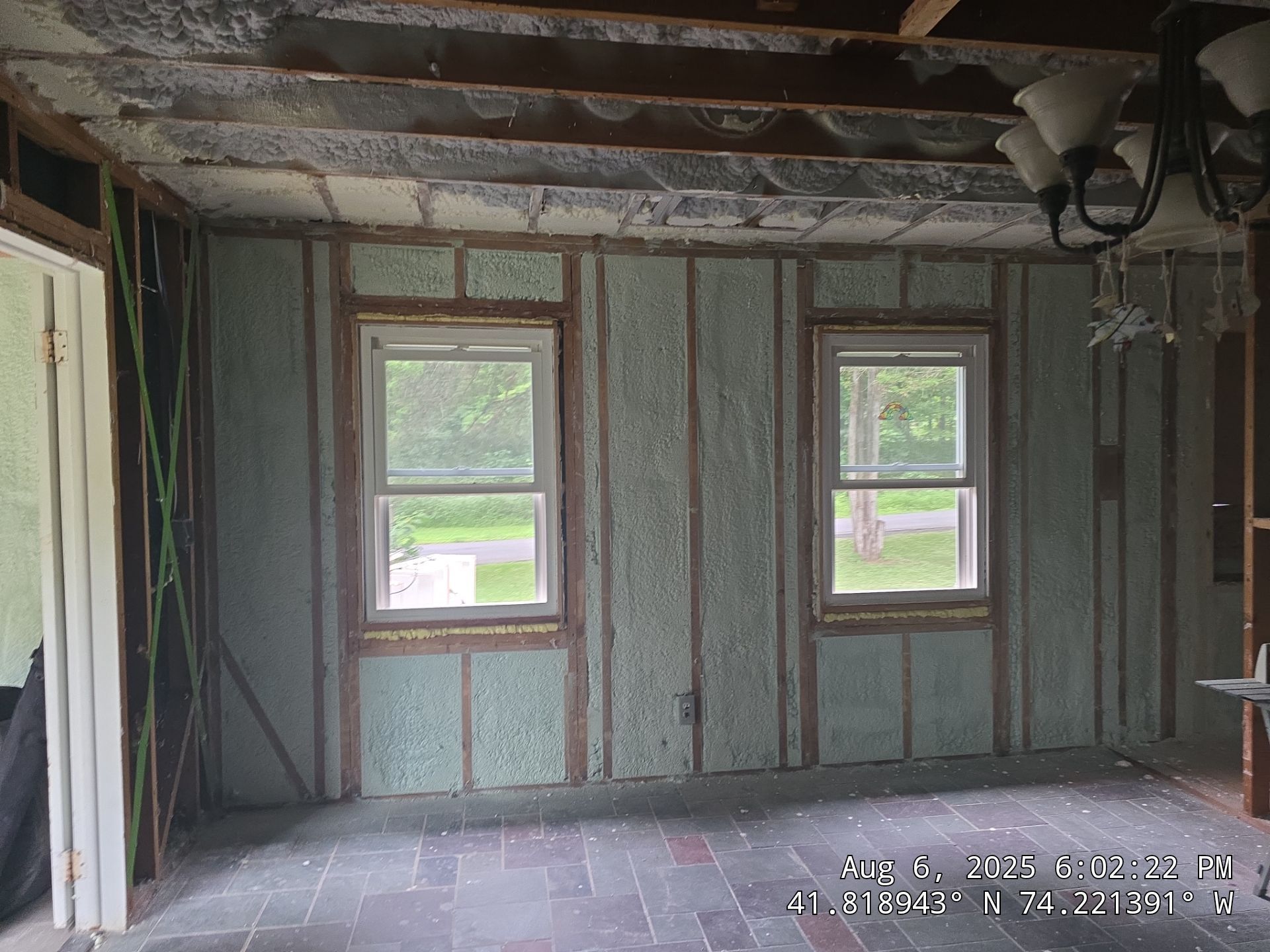 Master bedroom Exterior Walls using open cell spray foam by NYS Foam & Energy