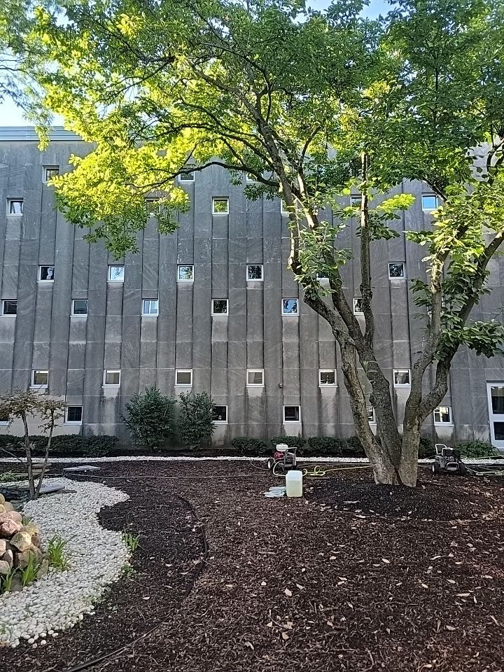 Courtyard pressure washing difficult access.  by Northern Power Washing LLC.