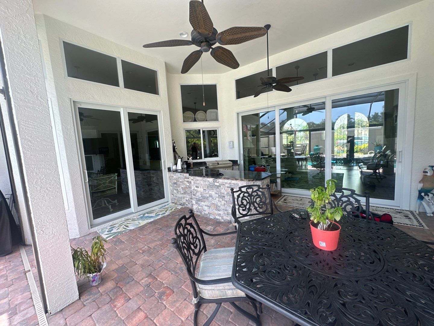 Window Installation using PGT Aluminum for the doors and PGT Vinyl for the Windows  by Windows For Life 