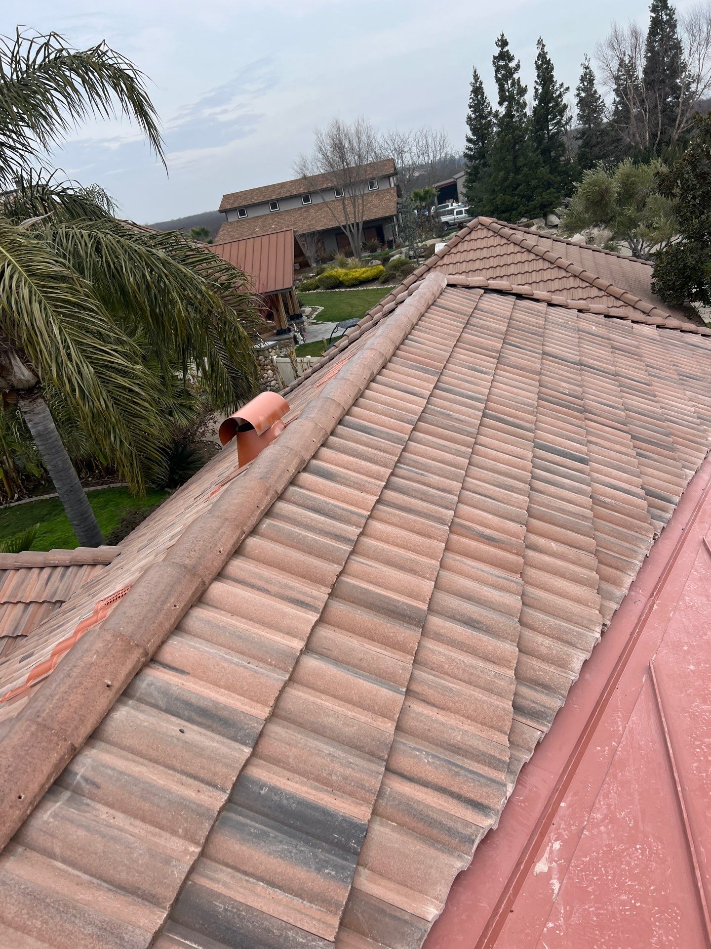 Tile, Metal, and TPO roofing project (new construction) by Straight Edge Roofing Inc