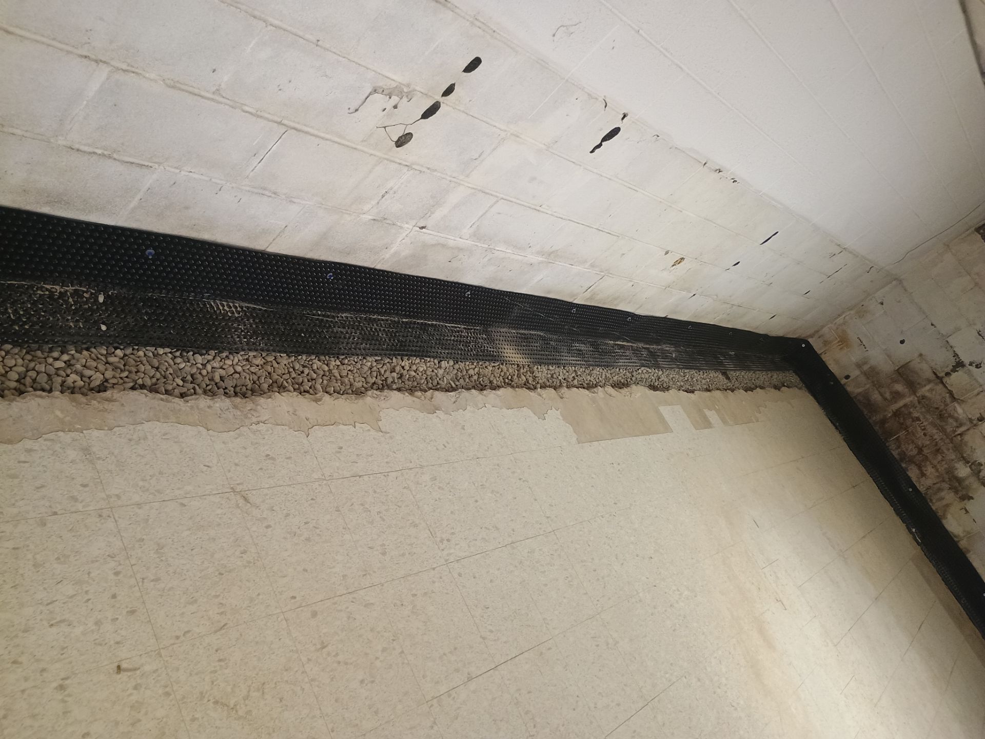 Interior Drain Tile Installation in Columbia Heights, MN by Waterproofing Northeast