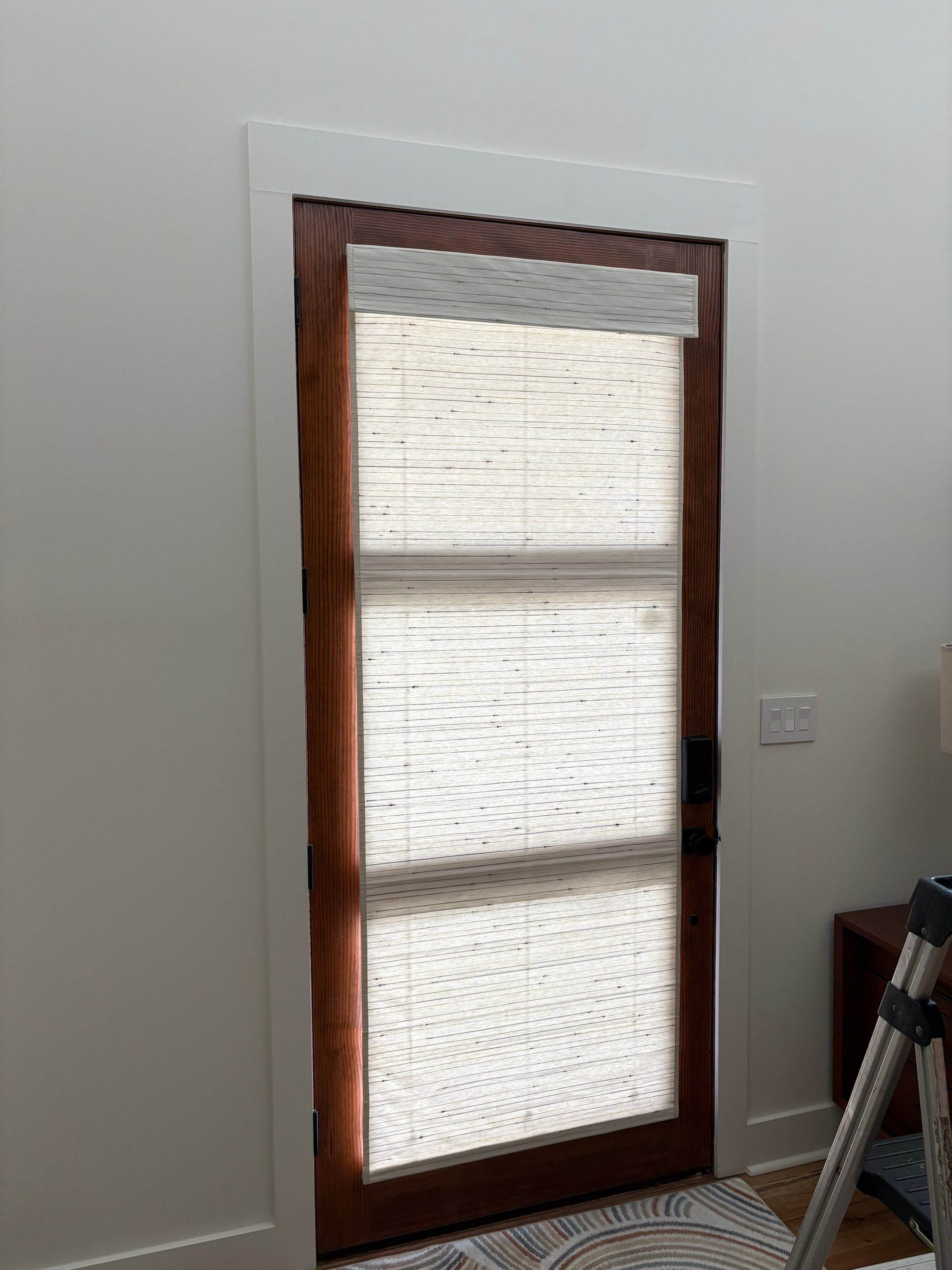 Roman and Woven Wood Shades Project in Huntsville by Blinds and Borders