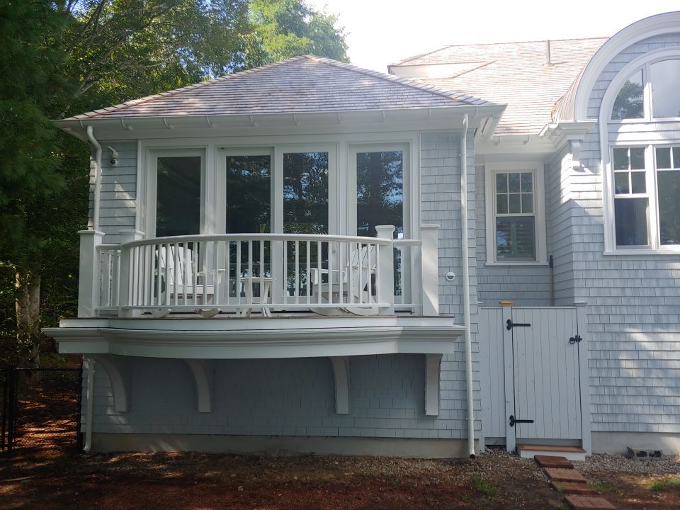 Gutter Installation using 6" Half Round Aluminum Gutter over Crown Moulding by Gutter Pro Enterprises