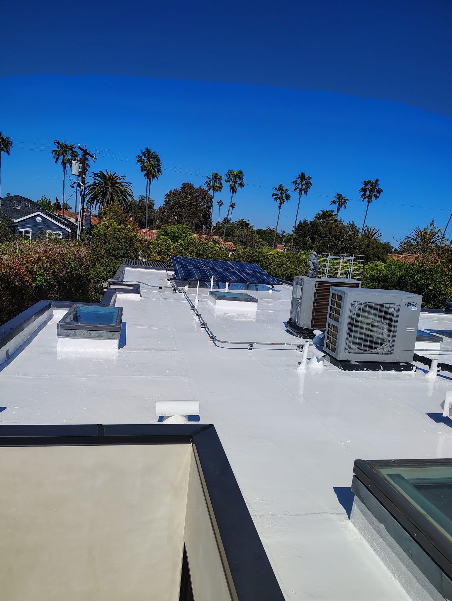 Silicone Membrane Installation using American Standard Coatings Silicone-S by Hull Brothers Roofing