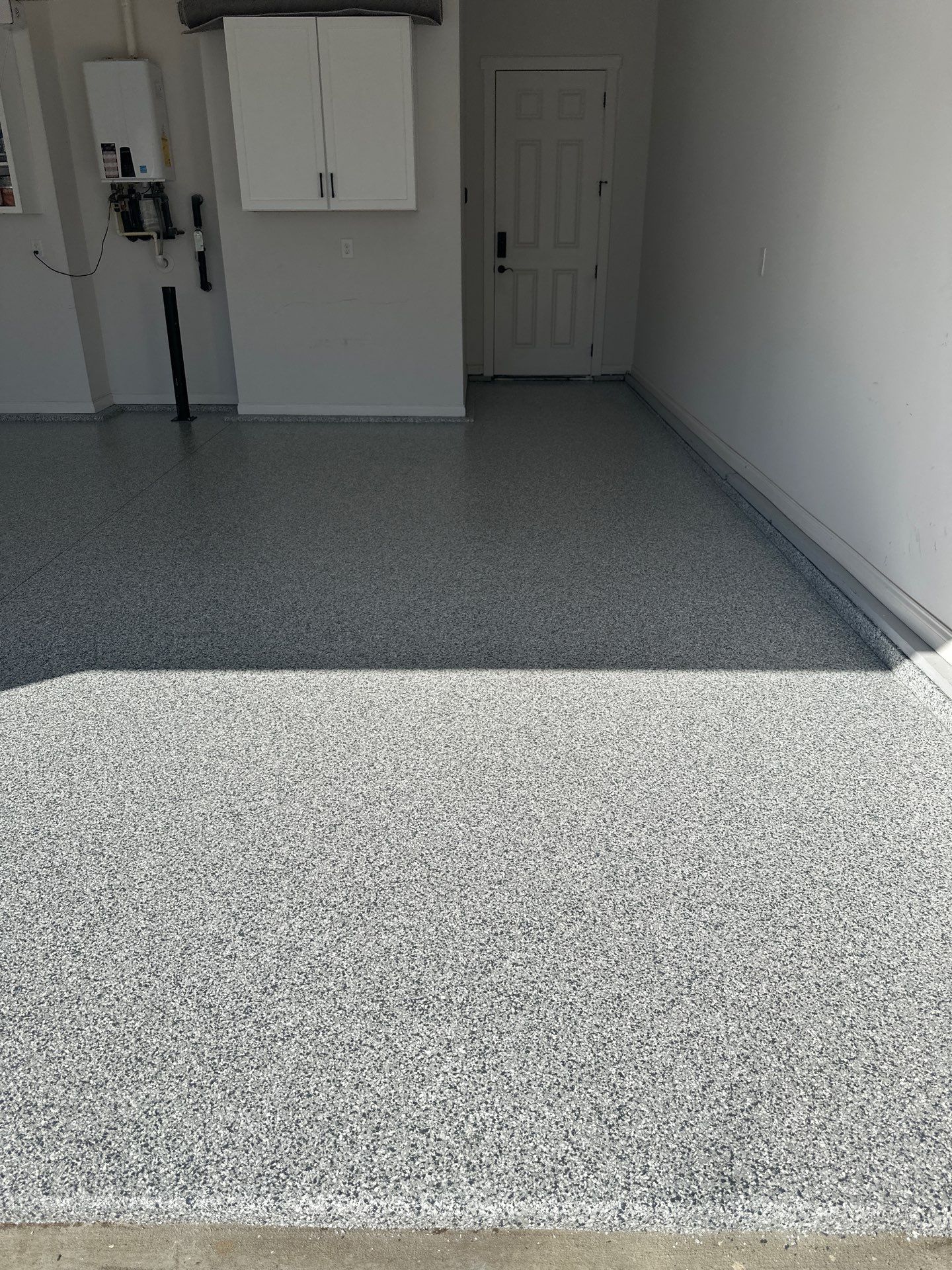 Garage Floor Coating using Gravel by My Garage Floor Guys