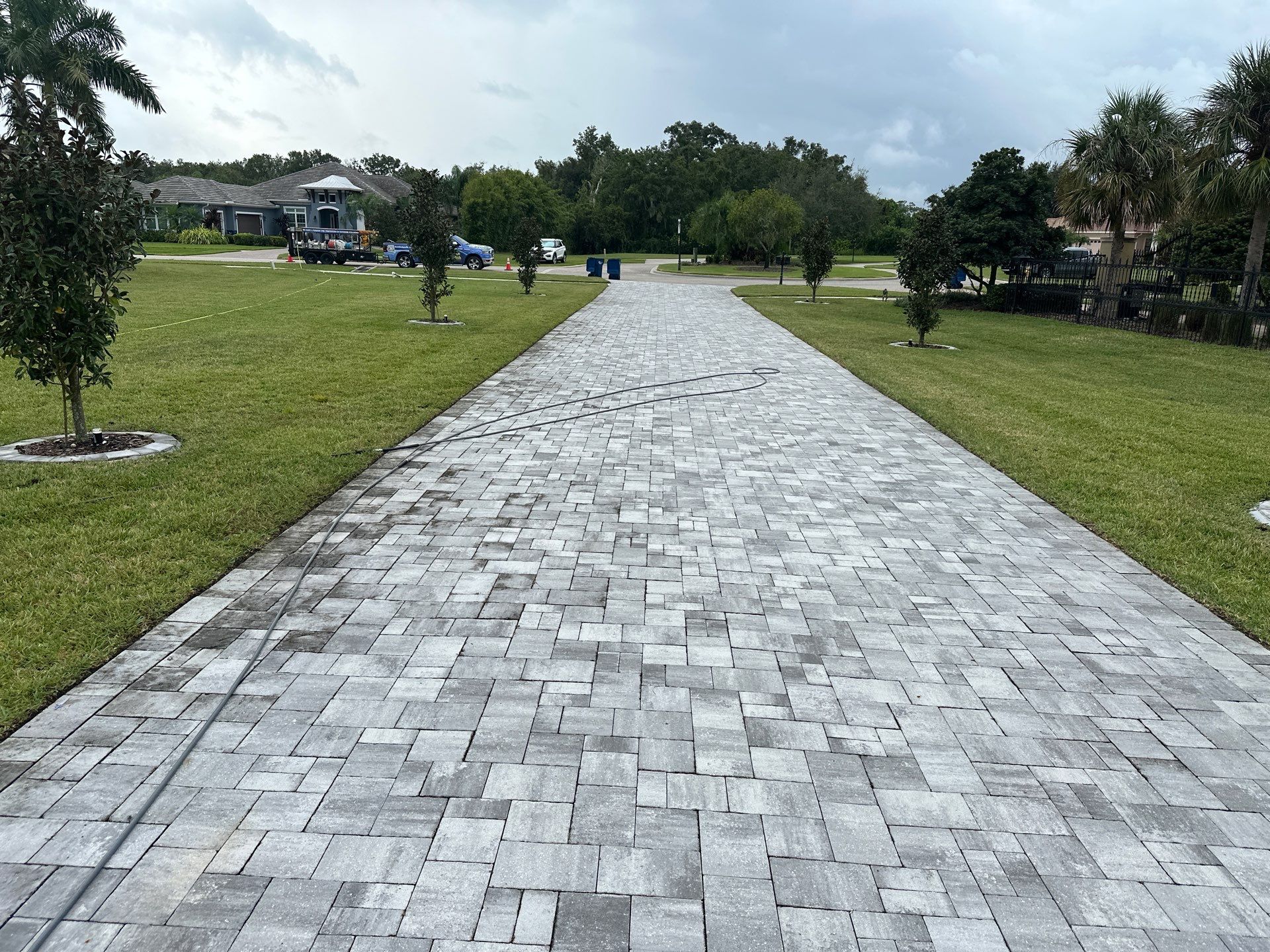 Complete Two-Story House Wash and Driveway Cleaning in Winding River Community, Bradenton, FL by Sunshine AquaWash