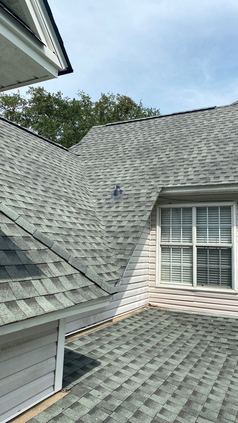Residential Roofing Installation using Roof Replacement by American Roofing & Construction LLC