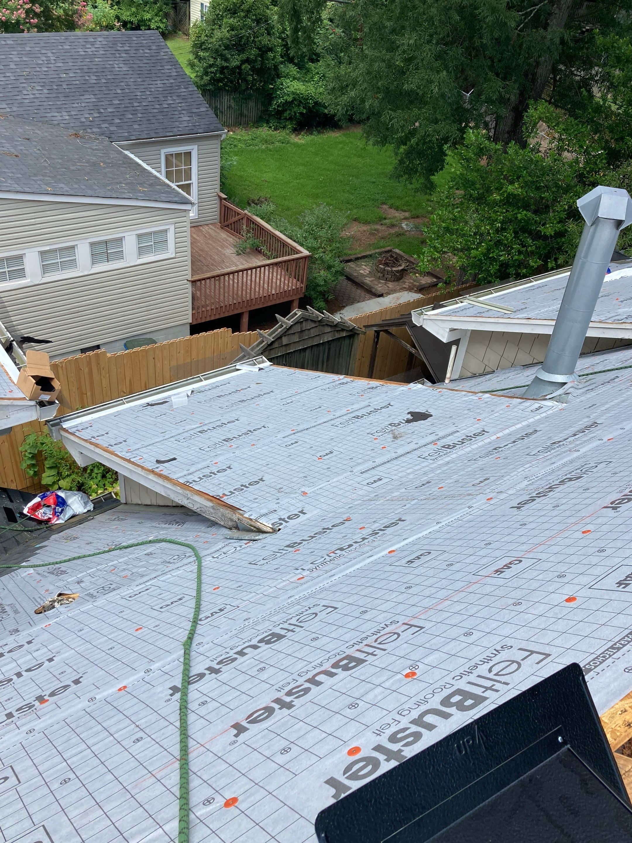 Residential Roofing Installation using Architectural Shingles by The Roofing Dudes